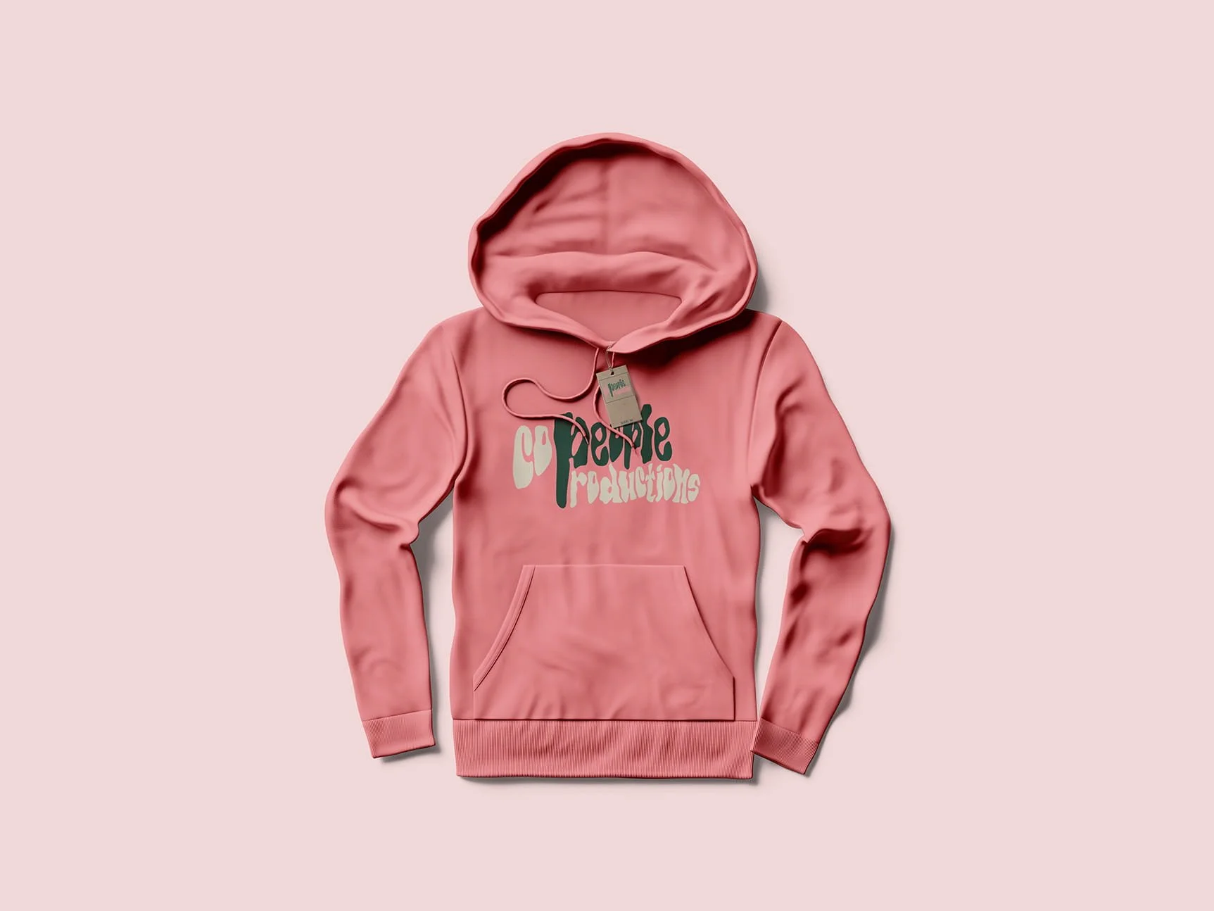 Pink hoodie with the words "Cute Production" printed on the front, displayed on a pink background.