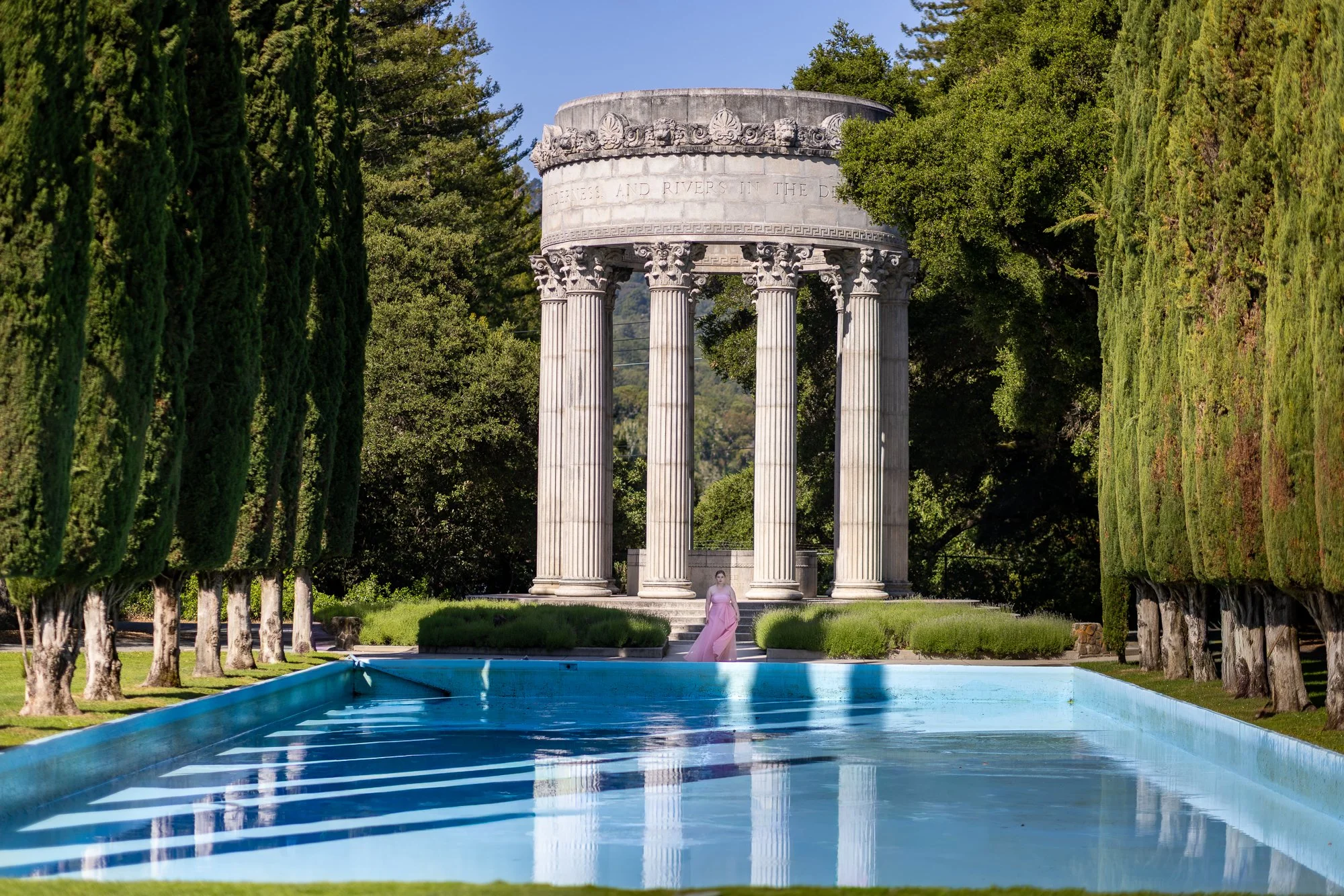 Pulgas Water Temple rotunda reflecting pool cypress allées model in pink dress, Bay Area editorial photography