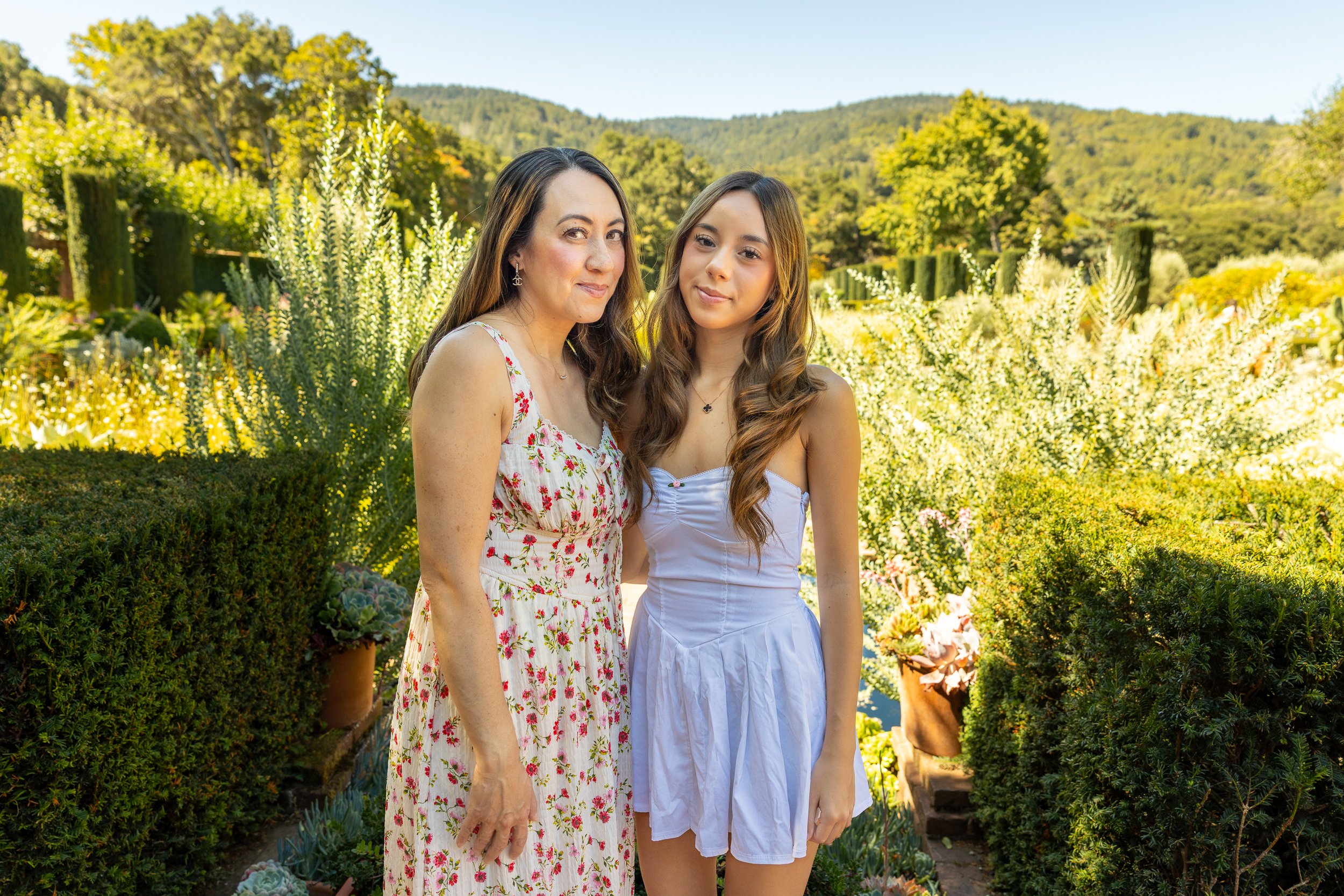 Mother and daughter at Filoli garden overlook with Santa Cruz Mountains behind