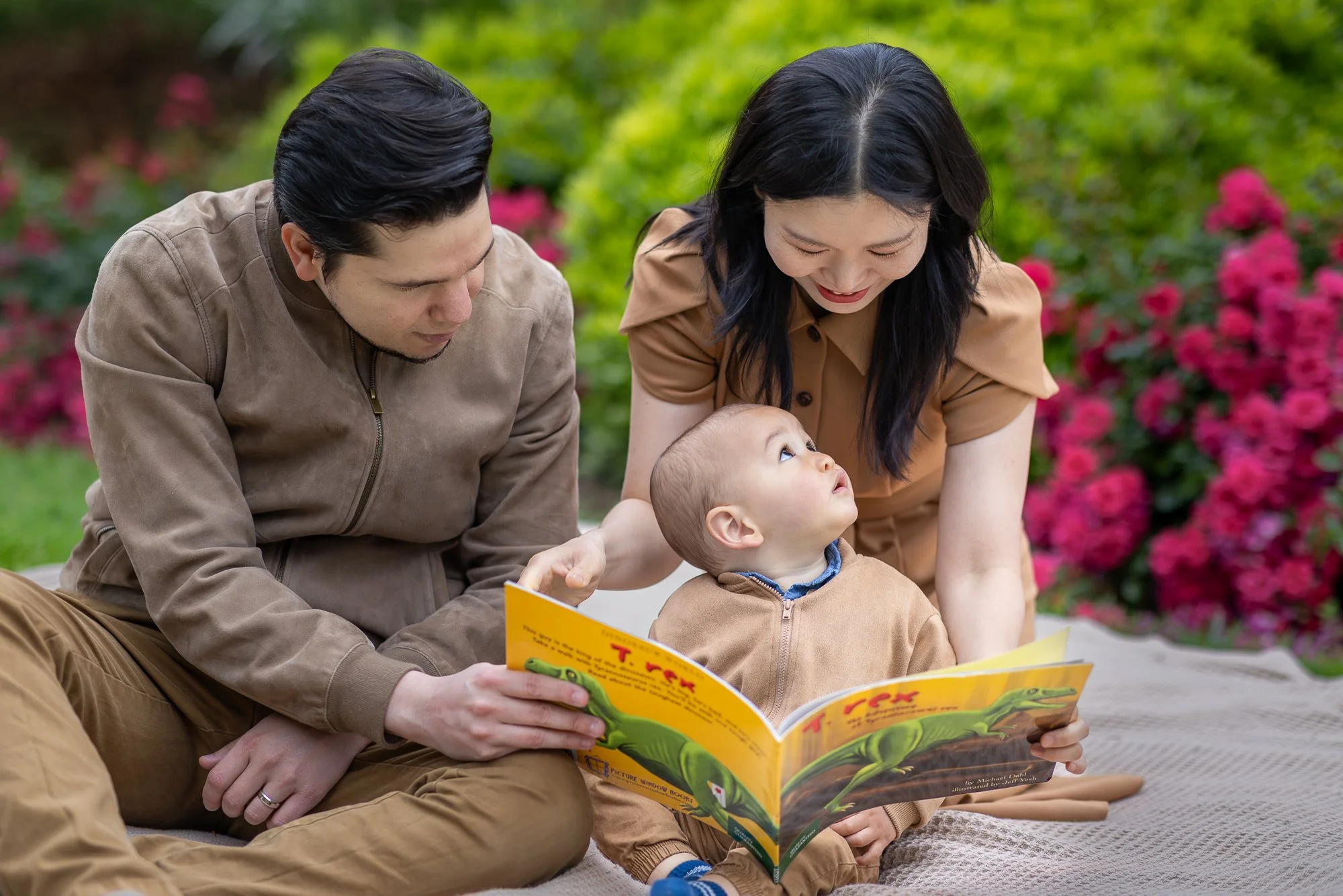 Mountain View family reading children's book at outdoor portrait session