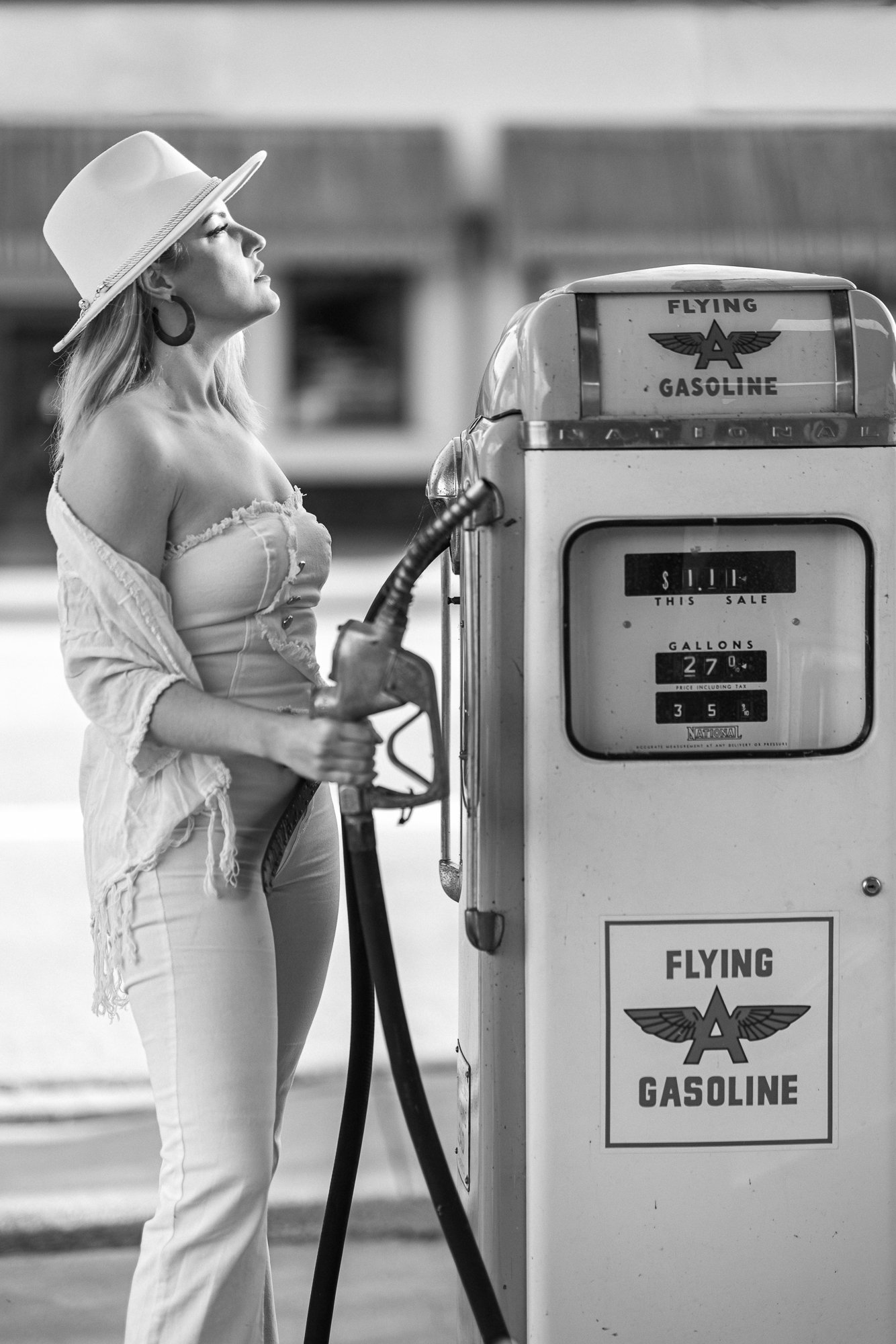Black and white editorial portrait at Niles Flying A vintage gas pump Fremont