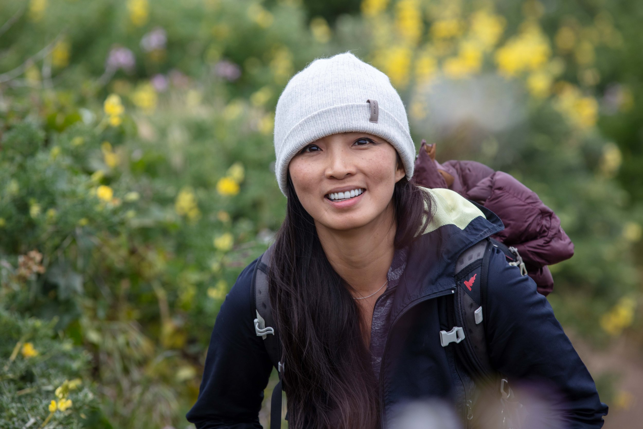 Outdoor personal lifestyle photography session Point Reyes Tomales Point Trail woman portrait yellow wildflowers spring Bay Area photographer