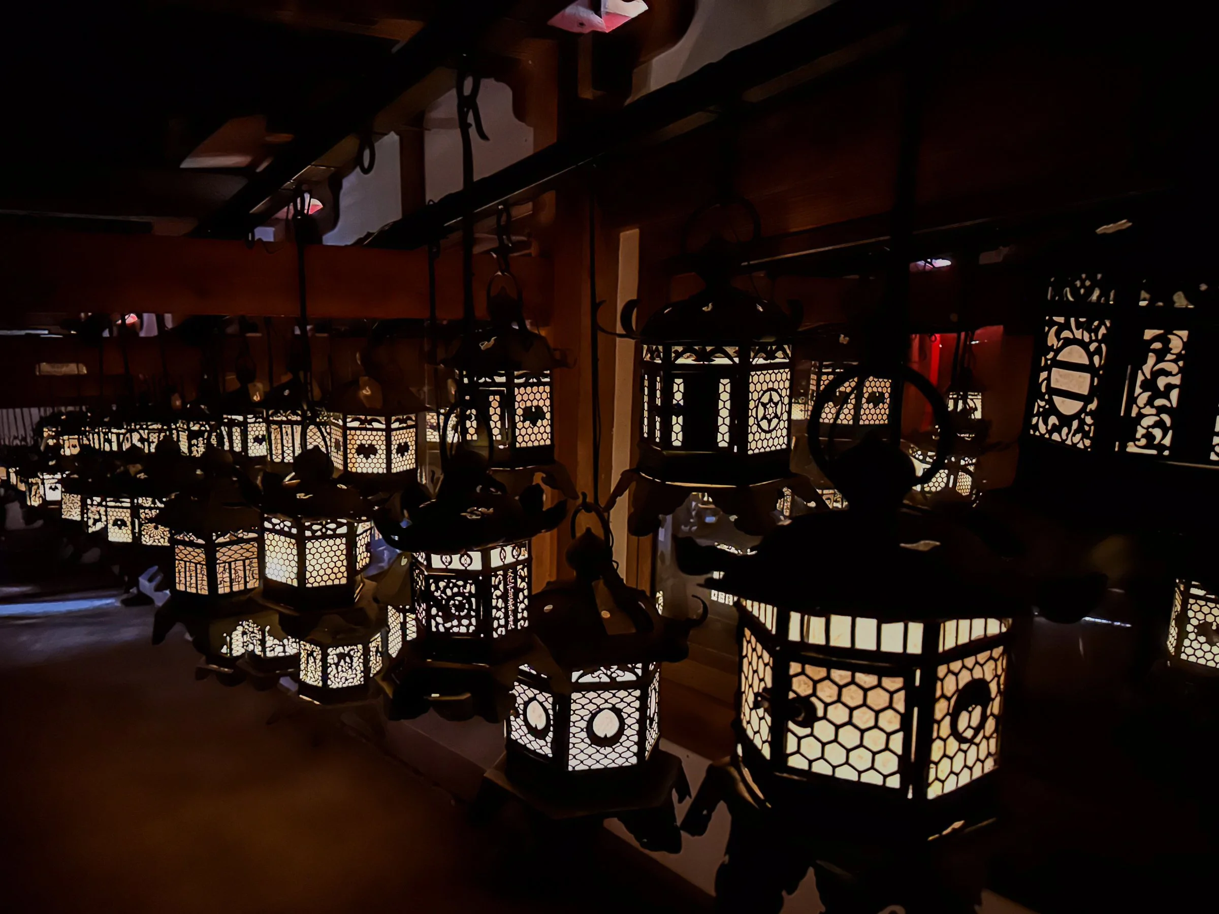 Kasuga Grand Shrine bronze hanging lanterns dimness Nara Japan