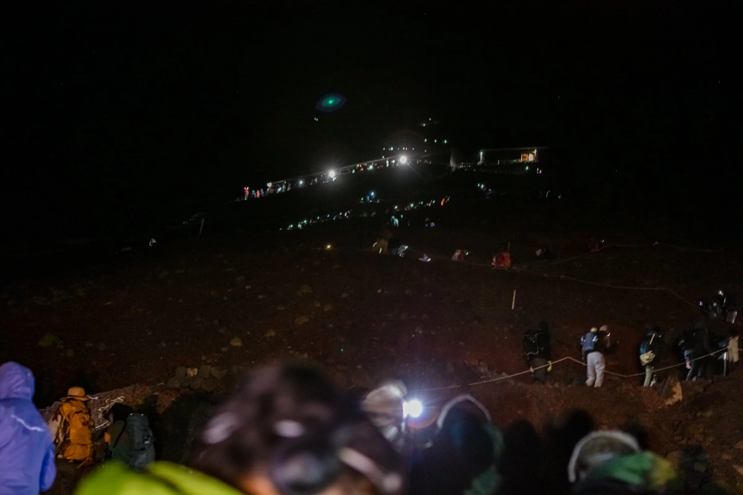 Mt Fuji night climb headlamps trail darkness overnight summit Japan