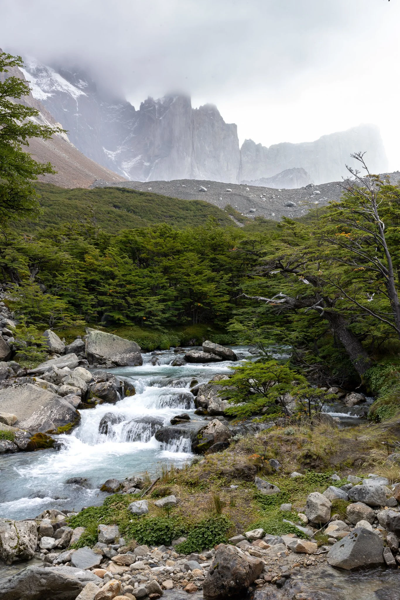 Climbing Britannia with stream in foreground and mountains in backgroun