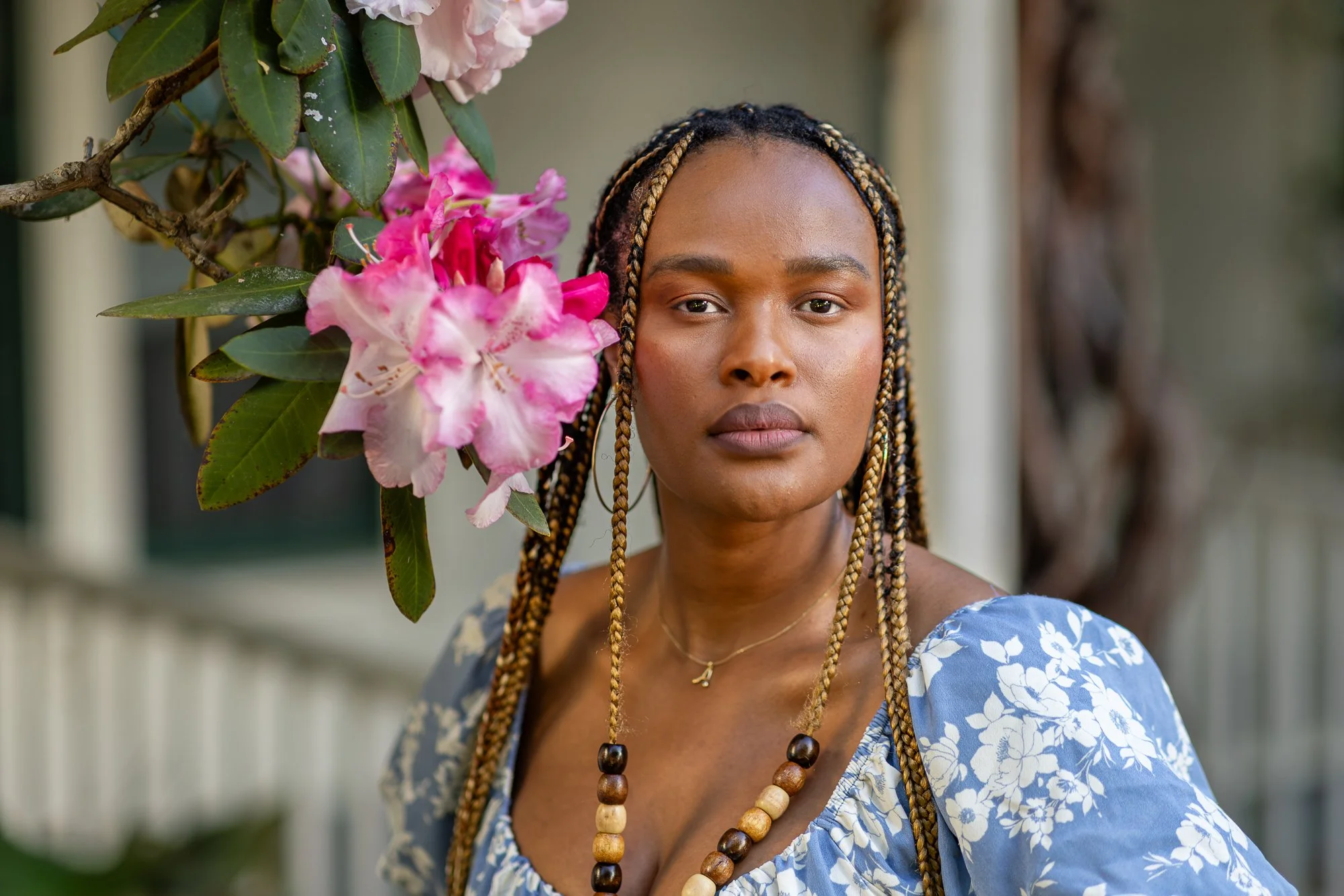 Shoreline Park Mountain View personal lifestyle photographer Black model with pink rhododendron portrait
