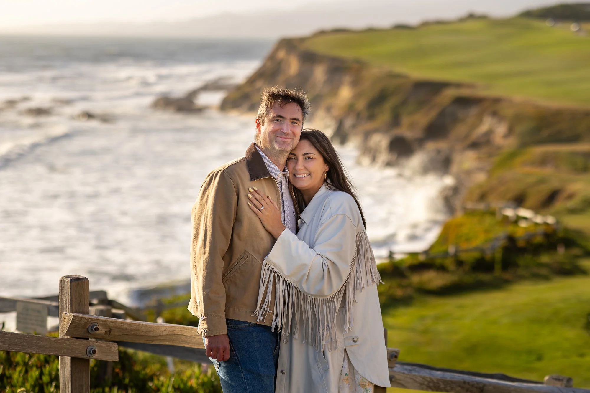 Engaged couple at golden hour by the coastal trail near the Ritz-Carlton, Half Moon Bay