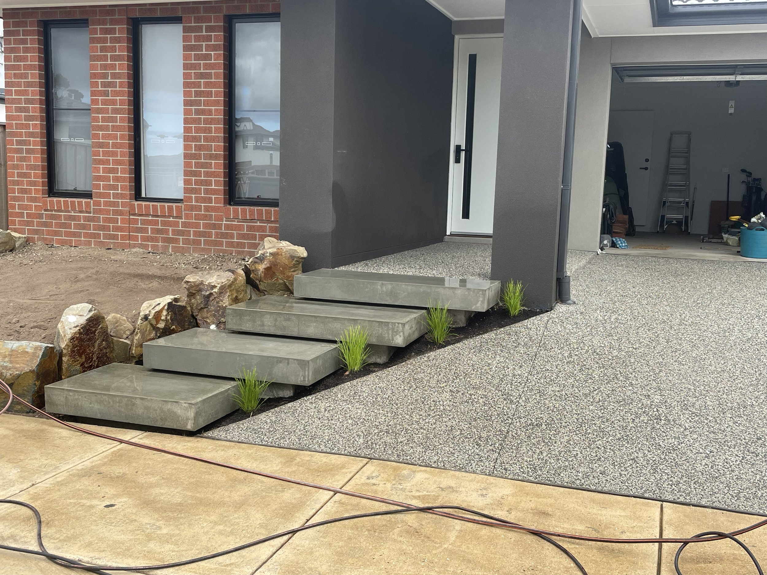 Hand burnished concrete floating steps