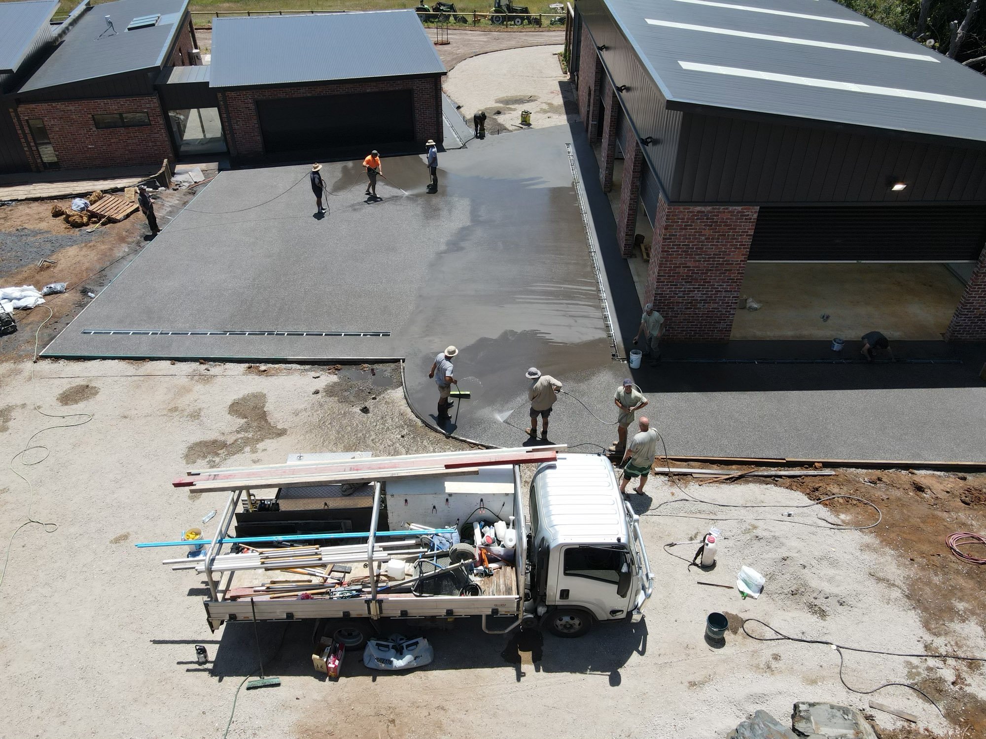 Pour day. 400 square metres exposed aggregate concrete driveway and house surrounds