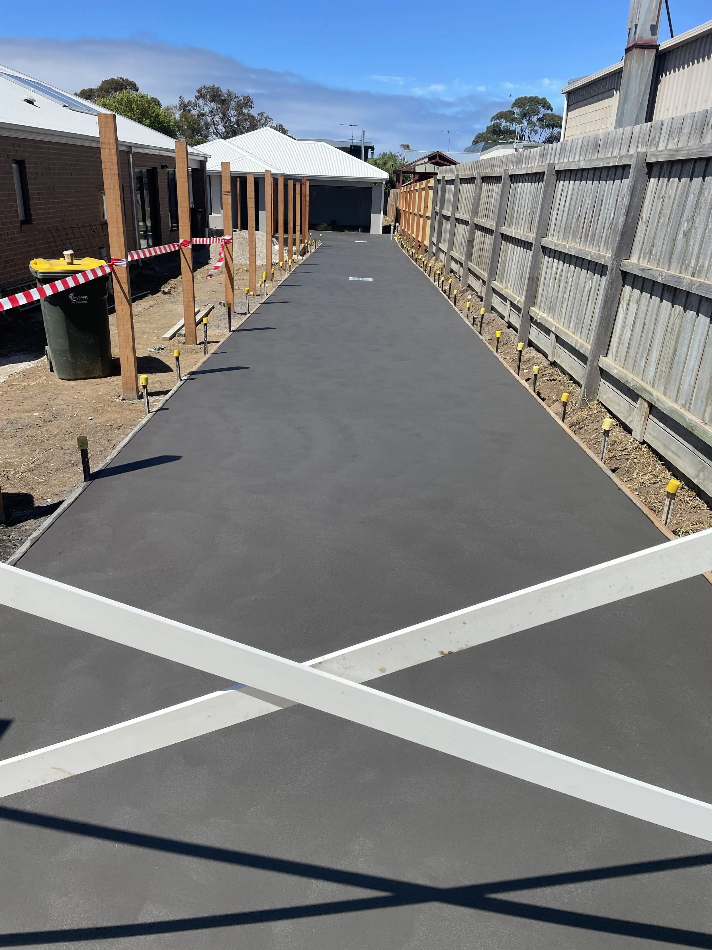 Charchoal colour concrete driveway