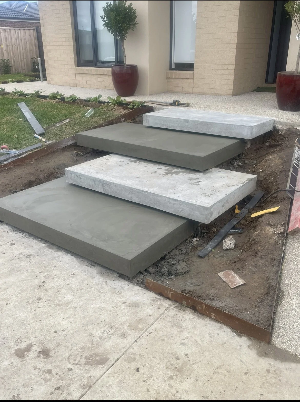Hand burnished concrete floating steps