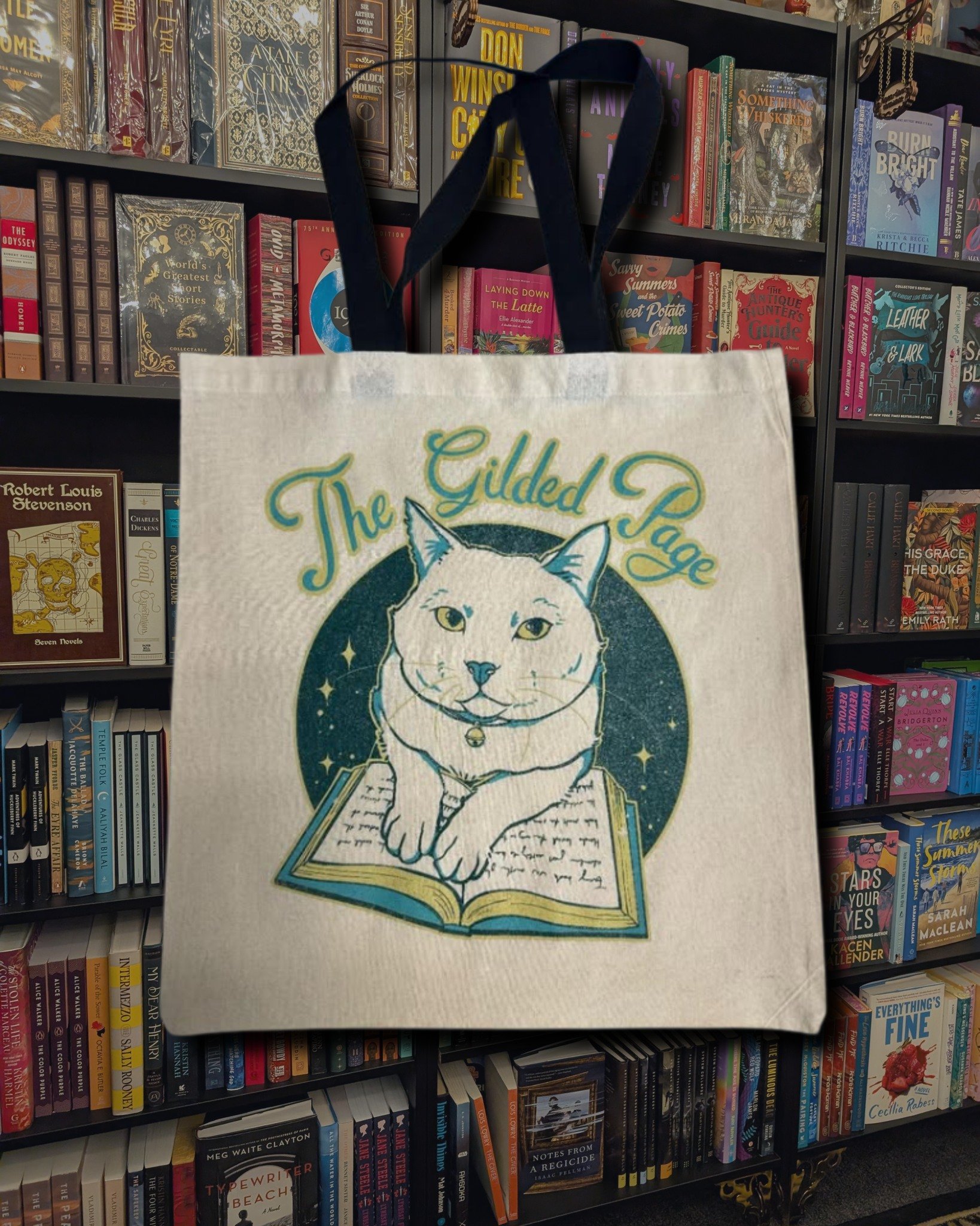 We have a prize wheel with ten slots and I am not going to pretend I haven't already spun it seventeen times just to watch it go. Renaissance Festival tickets are on it. So is a shop cat paw print painting, which is the most charming thing we have ev