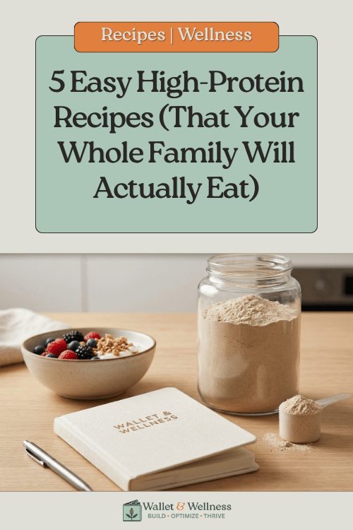 Close-up of healthy protein muffins on a cooling rack next to a Wallet & Wellness branded recipe journal.