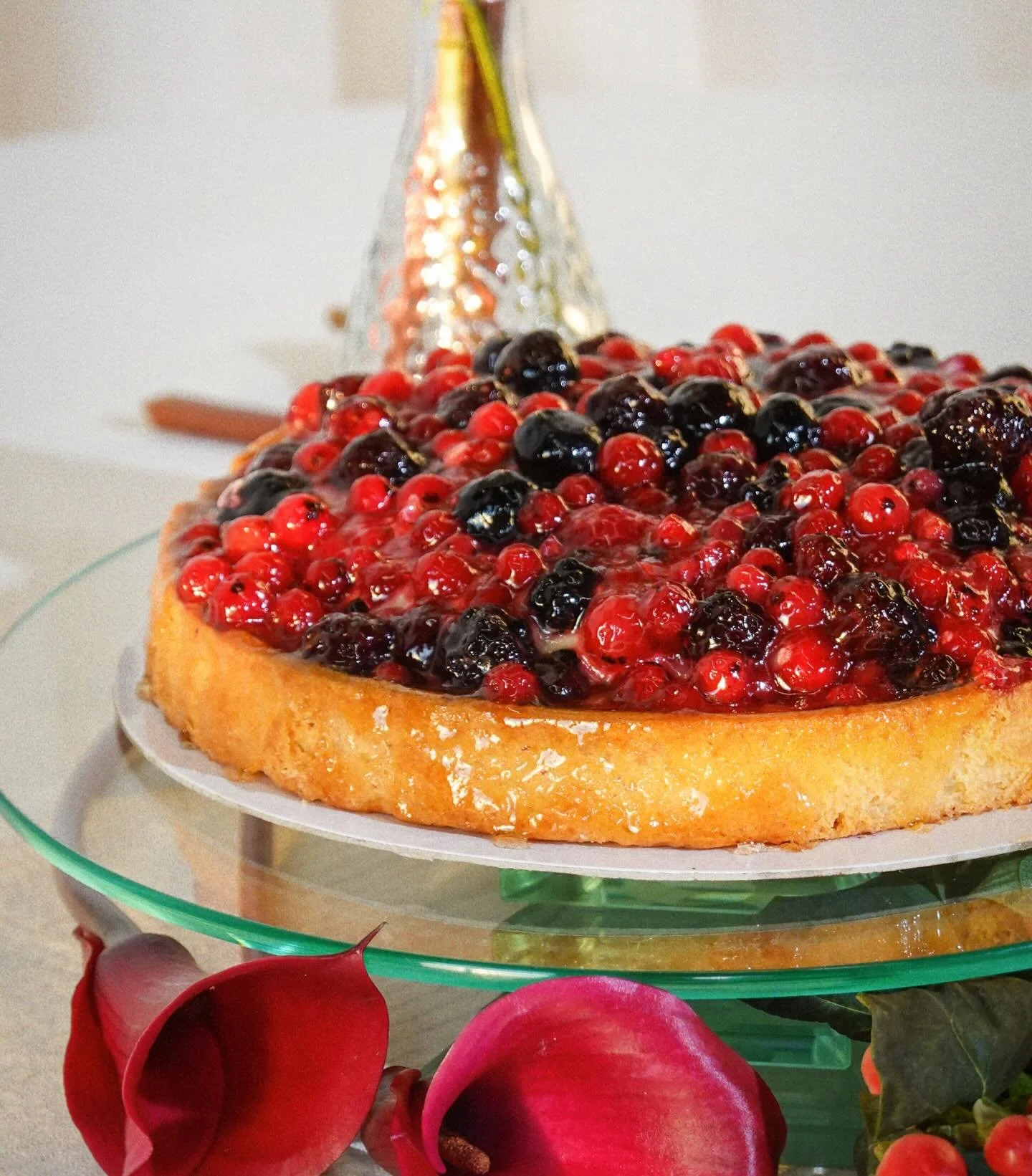 Wild berry tart 🫐

A soft, golden crust layered with seasonal berries and finished with a delicate glaze