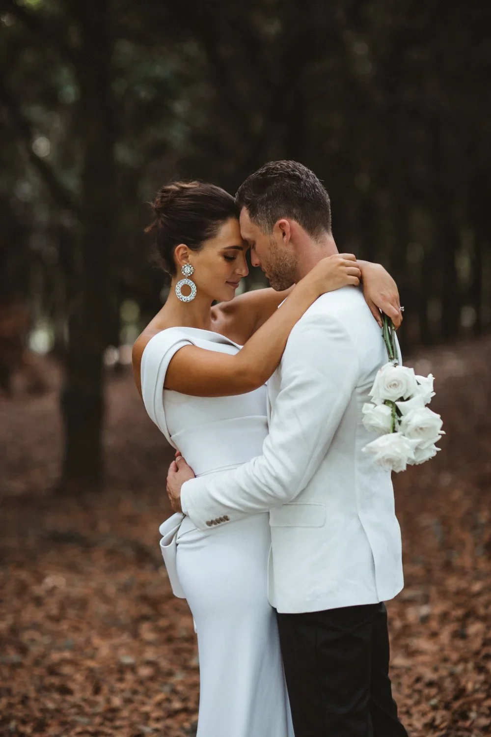 Newlyweds at The Orchard Estate after a wedding planned by Creative Weddings Byron Bay