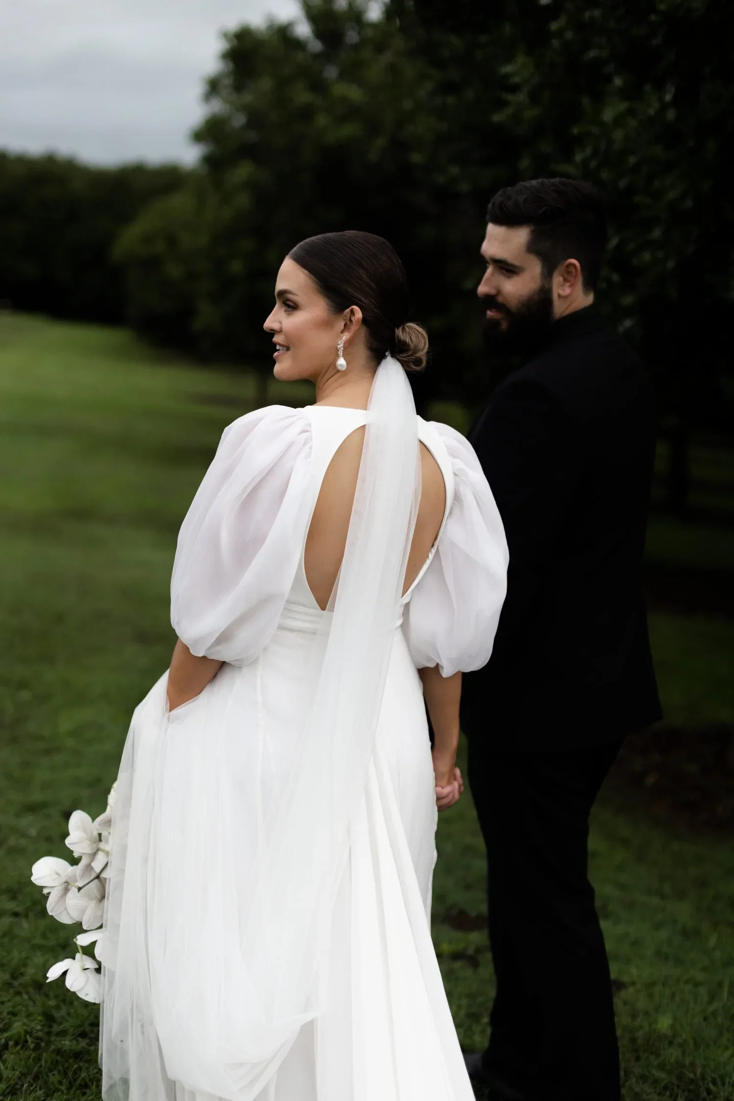 Newlyweds at The Orchard Estate after a wedding planned by Creative Weddings Byron Bay.