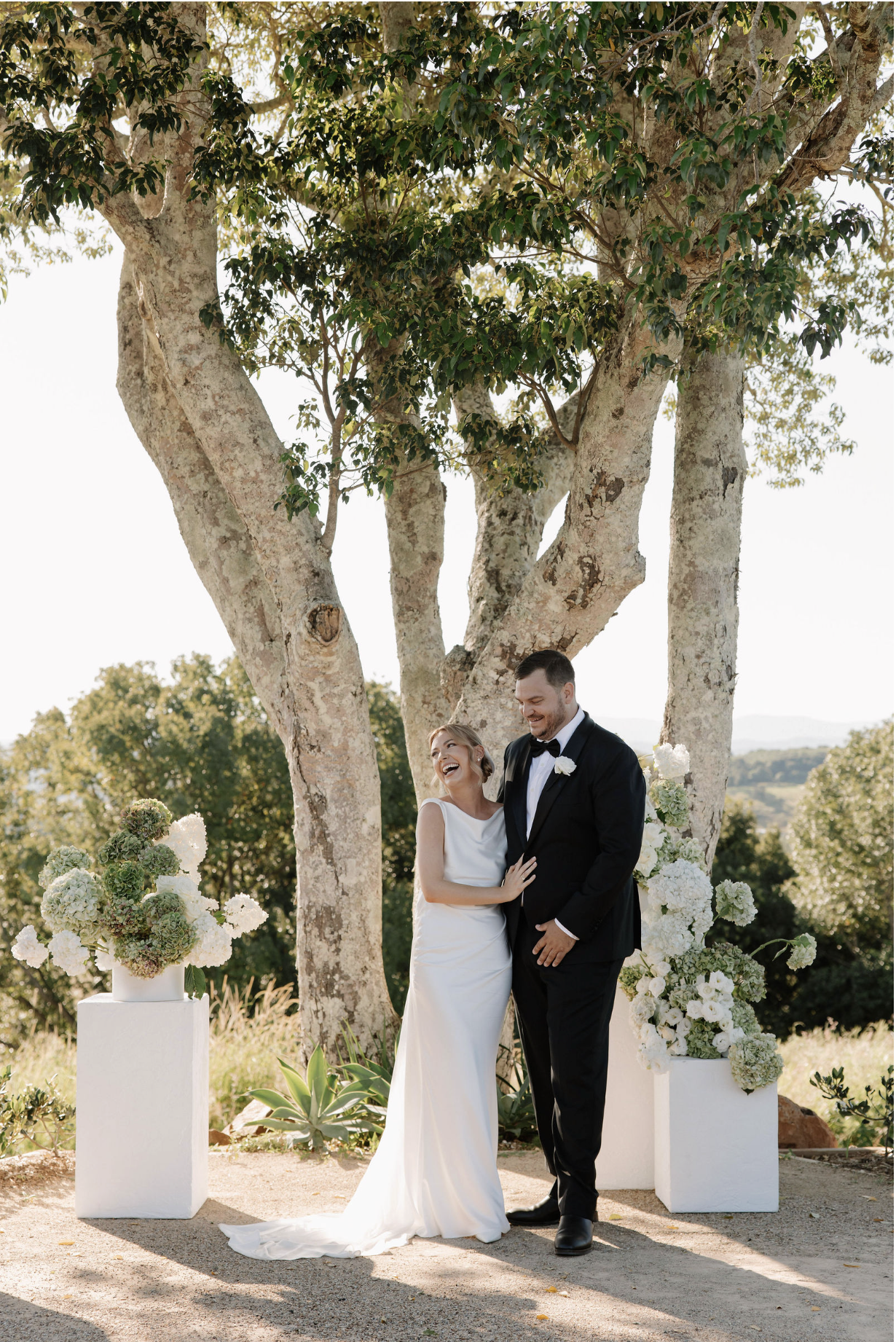 Newlyweds at The Orchard Estate after a wedding planned by Creative Weddings Byron Bay.