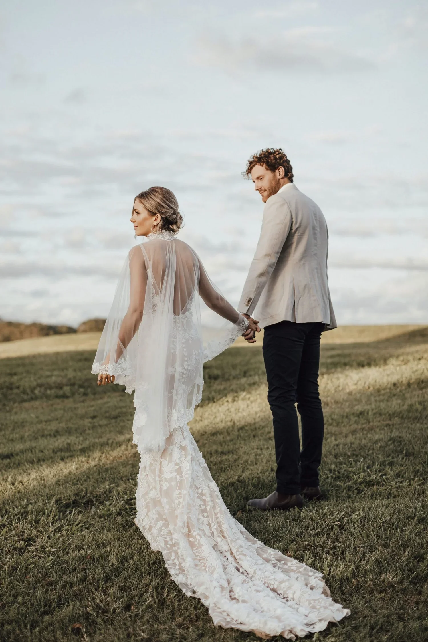 Newlyweds at The Orchard Estate after a wedding planned by Creative Weddings Byron Bay.