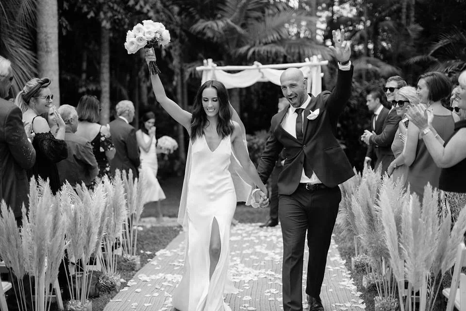 Newlyweds at The Orchard Estate after a wedding planned by Creative Weddings Byron Bay.