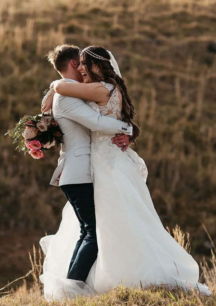 Happy couple celebrating their Byron Bay wedding planned by Creative Weddings Byron Bay.