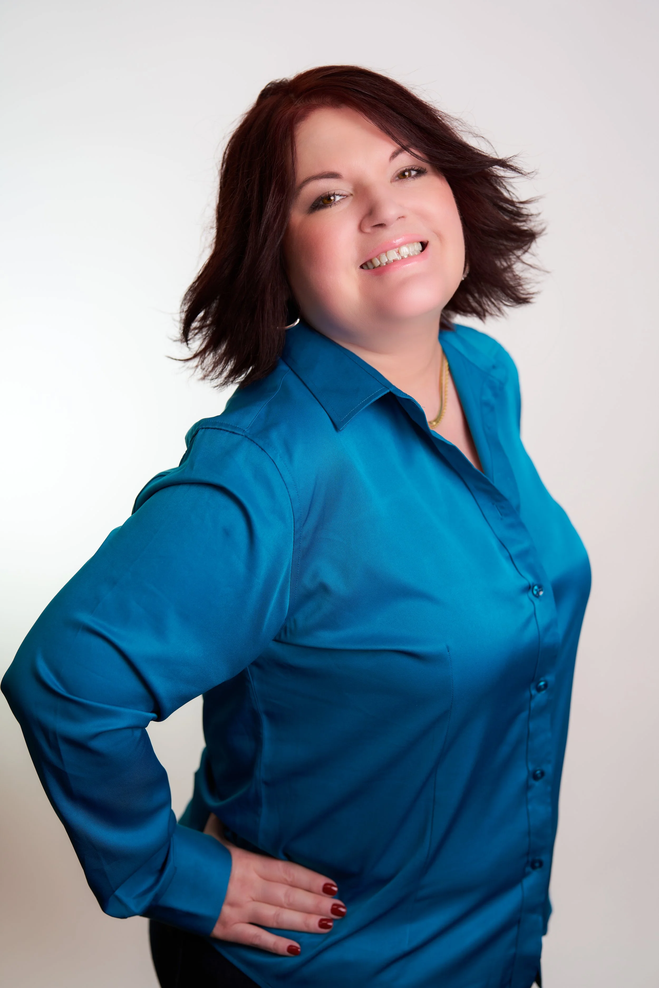 01_TinaEliana_Headshot_Primary.jpg