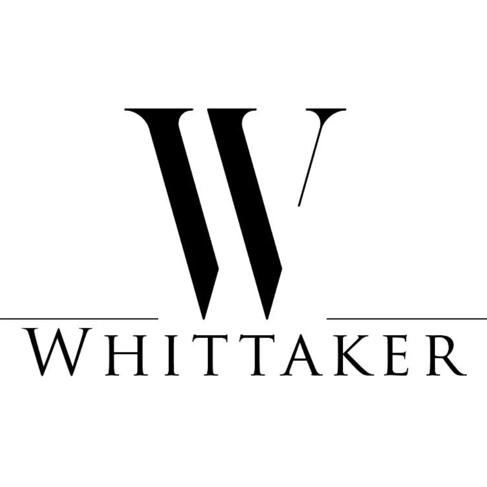 Whittaker script logo