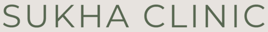 Text reading 'SUKHA CLINIC' in green letters on a white background.