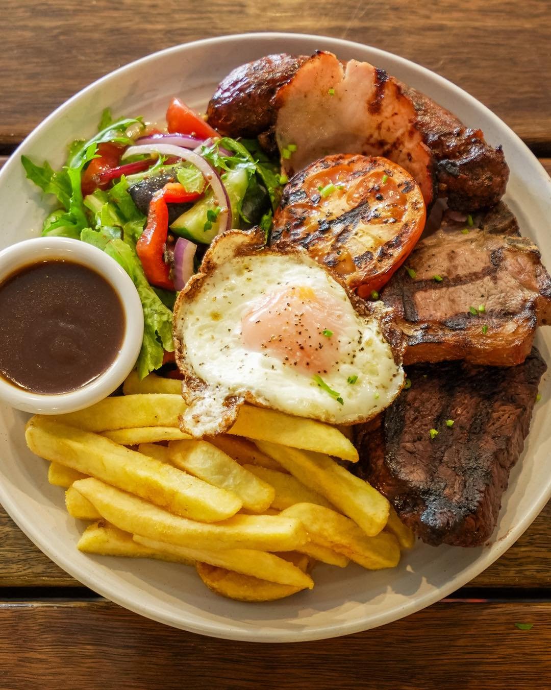 🔥 Thursday Night Special

Dig into our Signature Mixed Grill for just $29 &mdash; that&rsquo;s $10 off!

🥩 What&rsquo;s on the plate:
150g rump steak, beef sausage, lamb chop, crispy bacon, fried egg &amp; grilled tomato
Served with golden chips, f