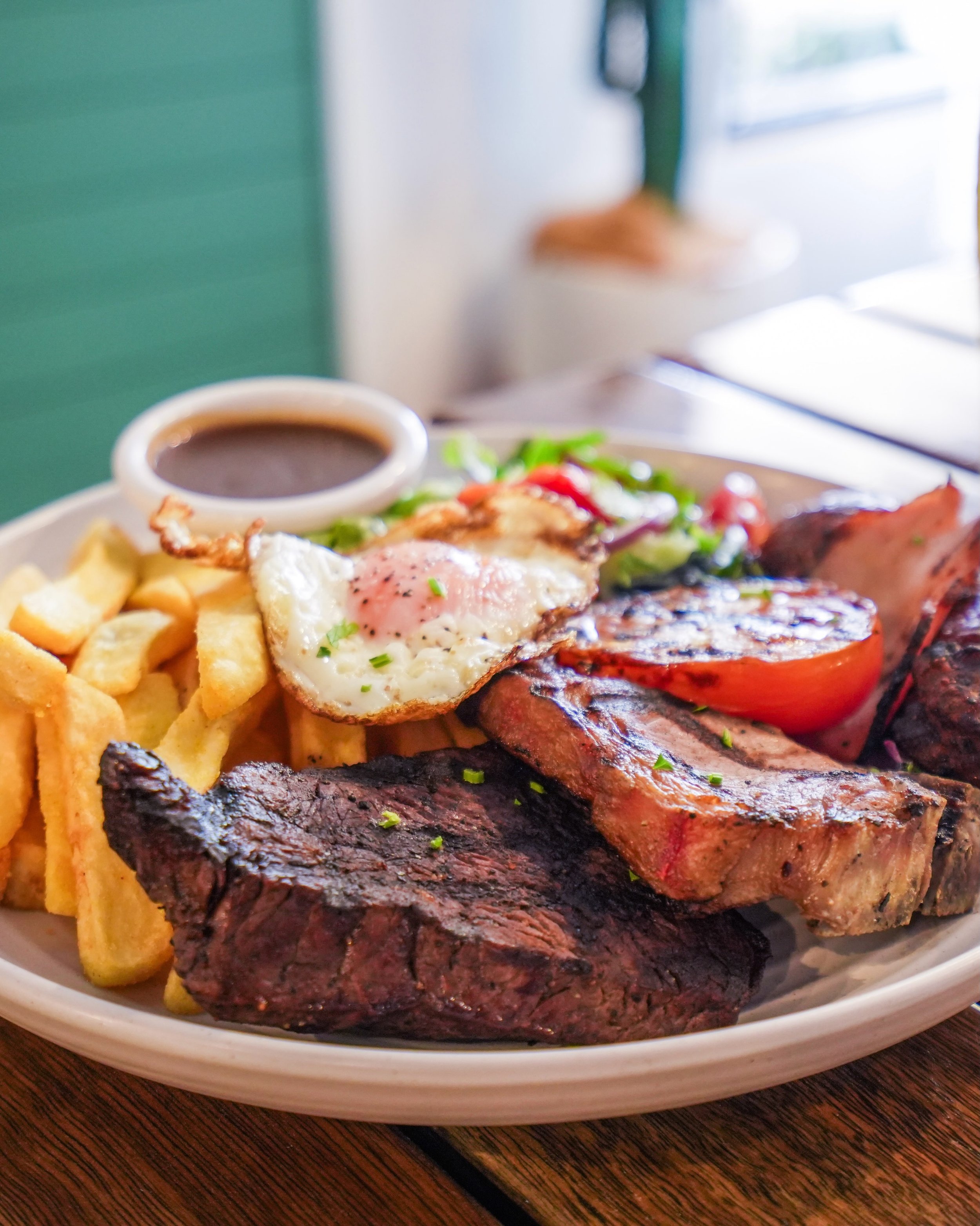 Tonight, enjoy our Signature Mixed Grill for only $29.

A generous selection of premium favourites including a 150g rump steak, lamb chop, beef sausage, bacon, fried egg and grilled tomato, complete with chips, fresh salad and your choice of sauce.

