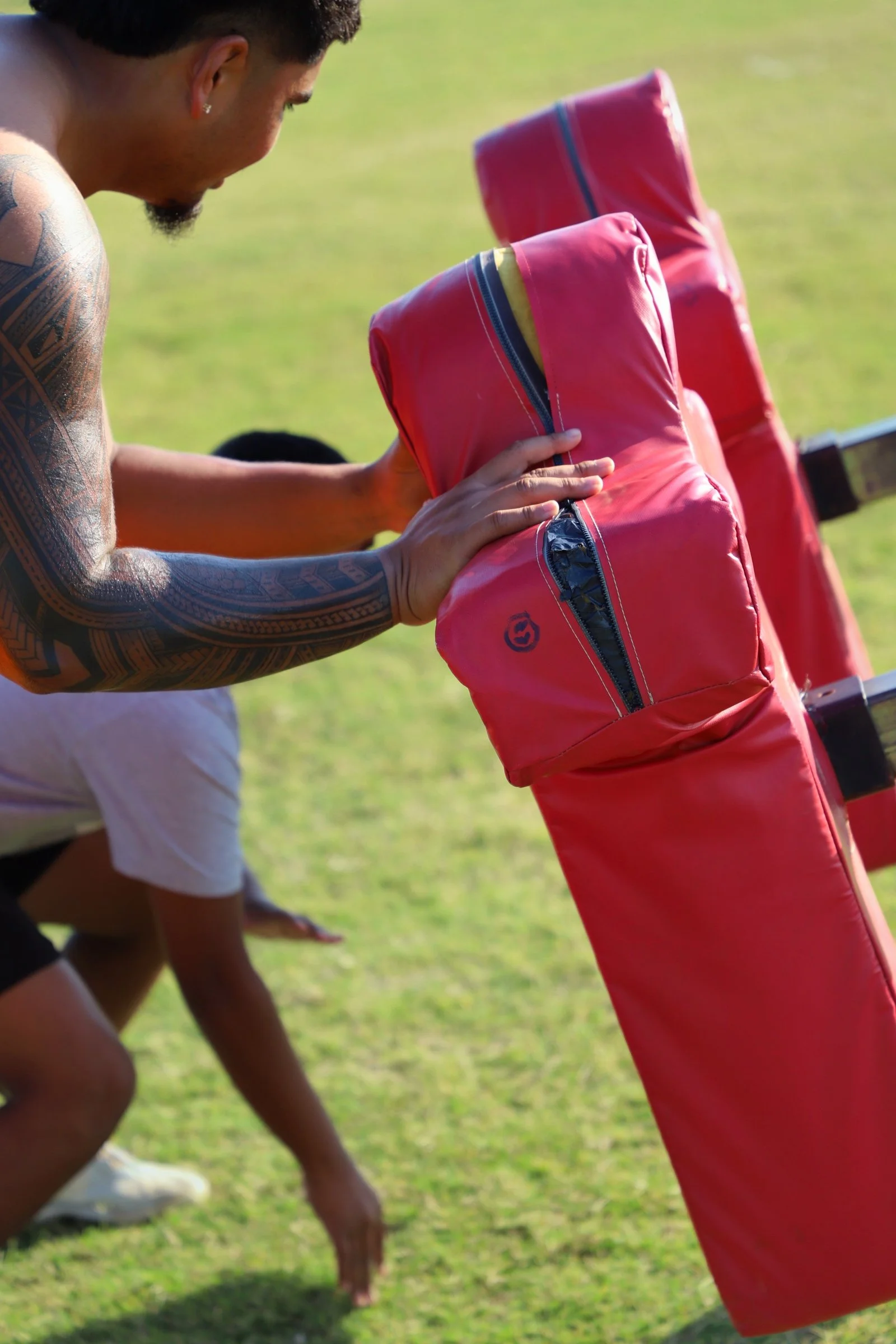 Antoni Ogumoro teaching drills to his younger brother Debron.