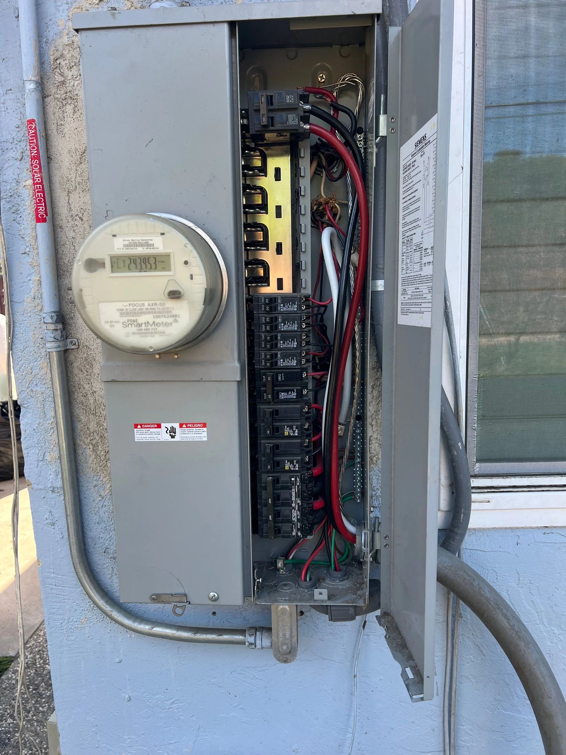 Previous installer's panel found unpermitted in San Jose by MH Electrical Services.