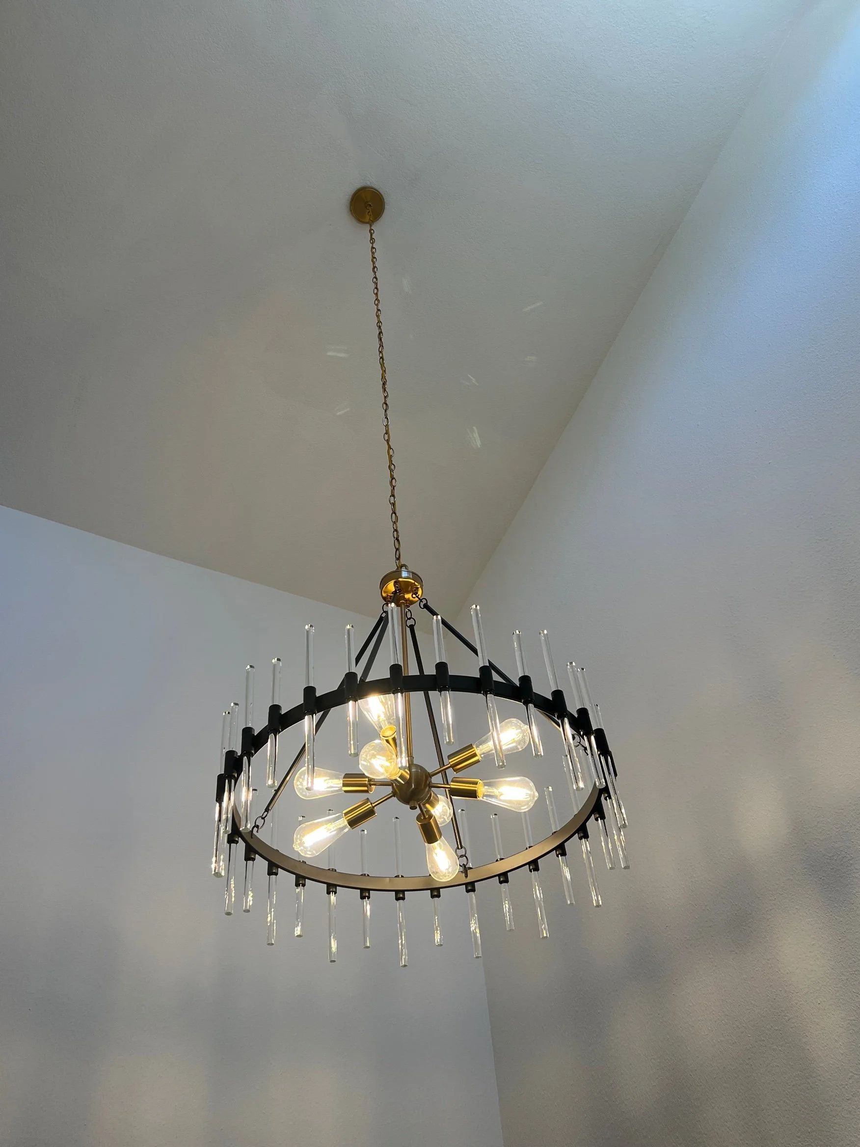 Entry chandelier installation in Stockton by MH Electrical Services.