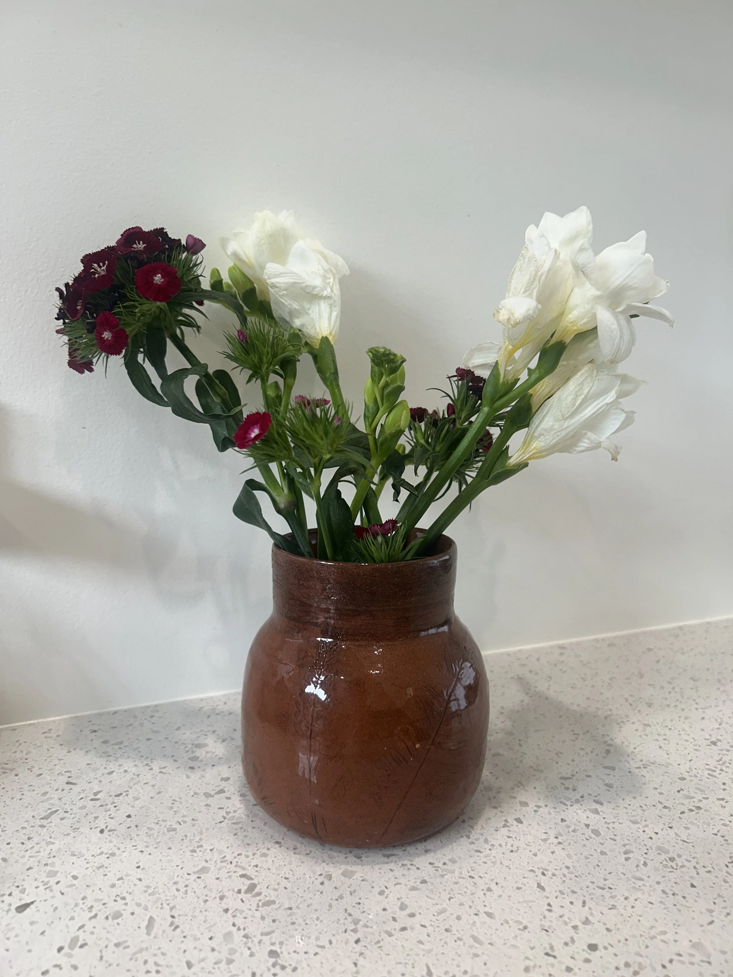 Handmade ceramic vase with  flowers