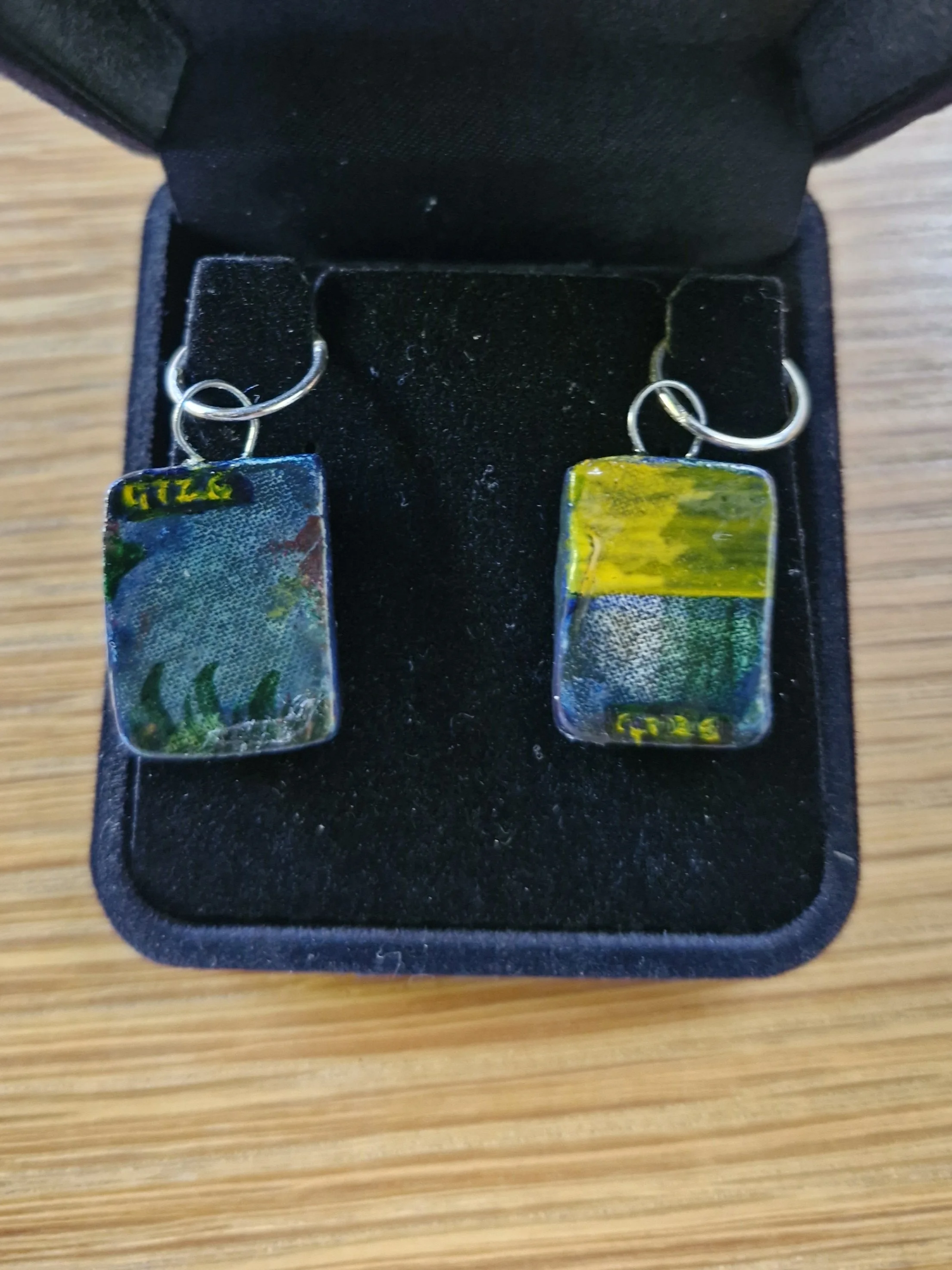 'Present/Absent' earrings (back) : Porcelain, oil paint, enamel, tungsten wire, sterling silver sleepers. Currently showing at The Collaboration, New Plymouth, Taranaki NZ