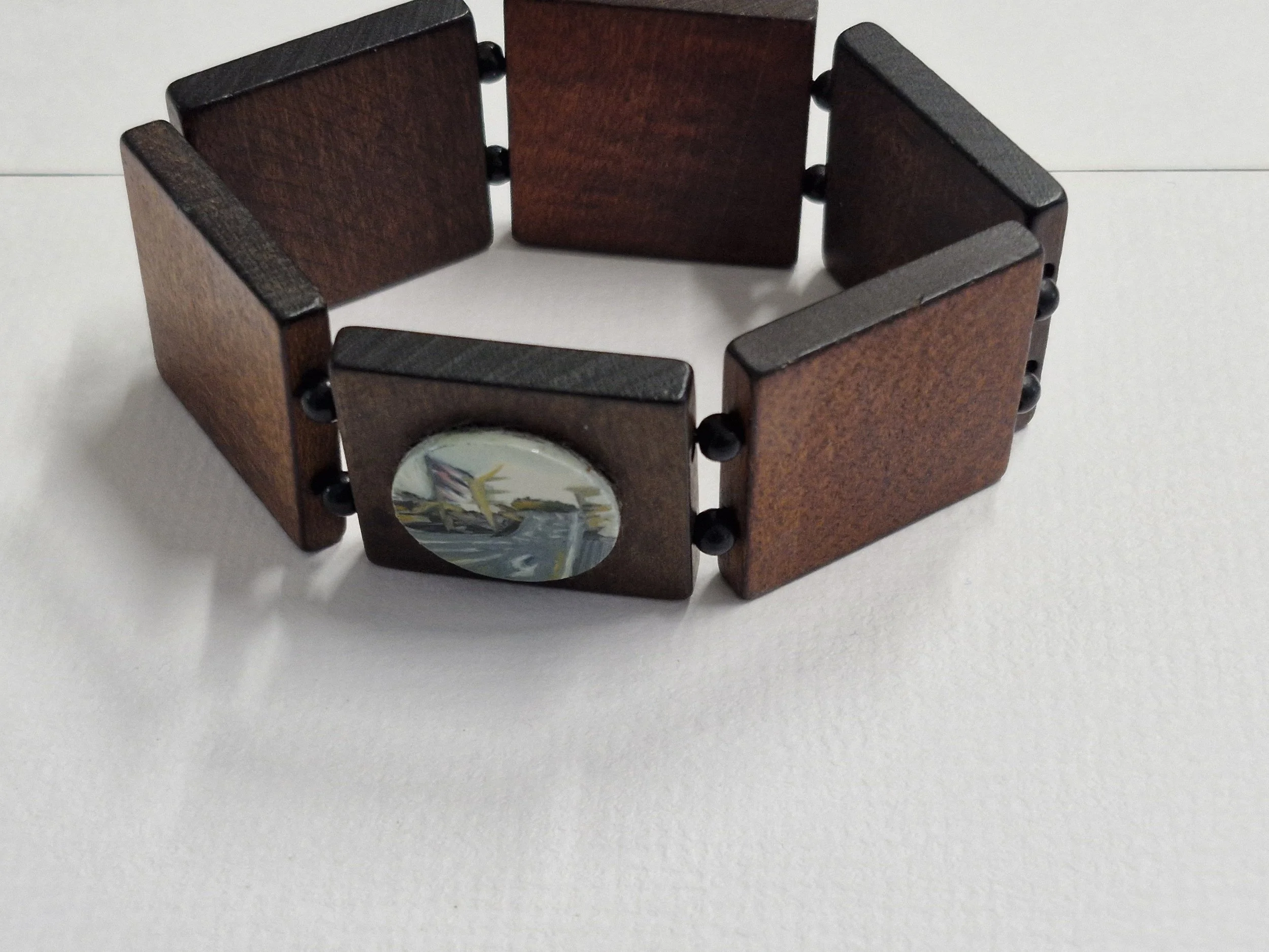 'Traveller' Bracelet : Oil paint and enamel on unknown wood. Currently showing at The Collaboration, New Plymouth, Taranaki NZ