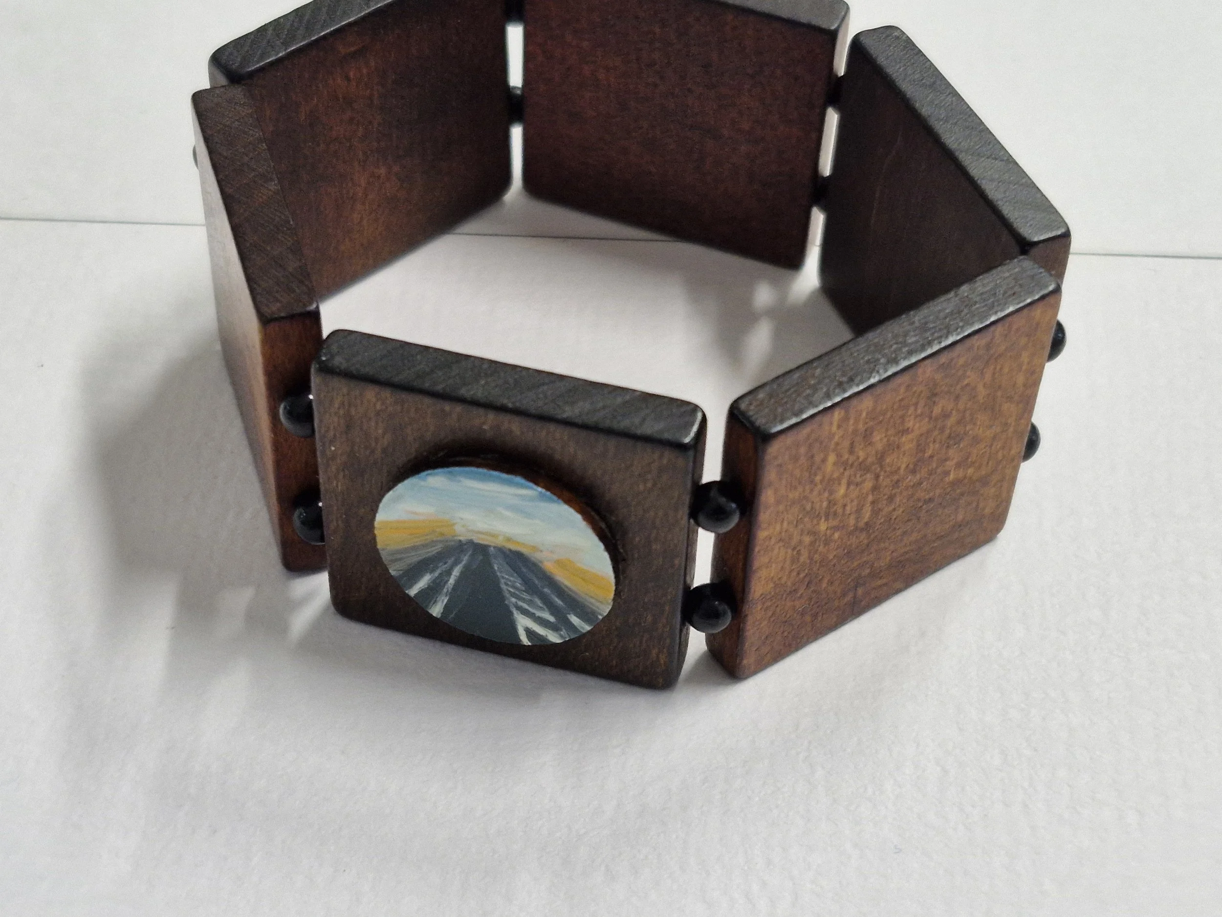 'Traveller' Bracelet : Oil paint and enamel on unknown wood. Currently showing at The Collaboration, New Plymouth, Taranaki NZ
