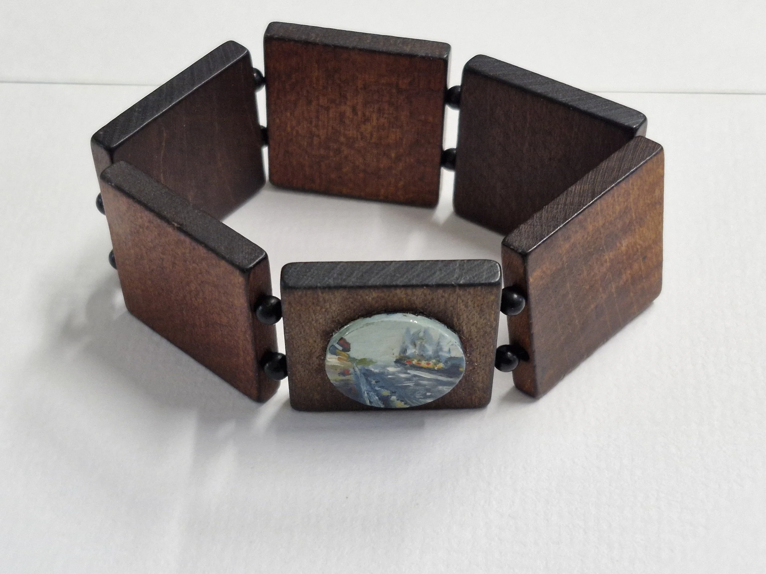 'Traveller' Bracelet : Oil paint and enamel on unknown wood. Currently showing at The Collaboration, New Plymouth, Taranaki NZ