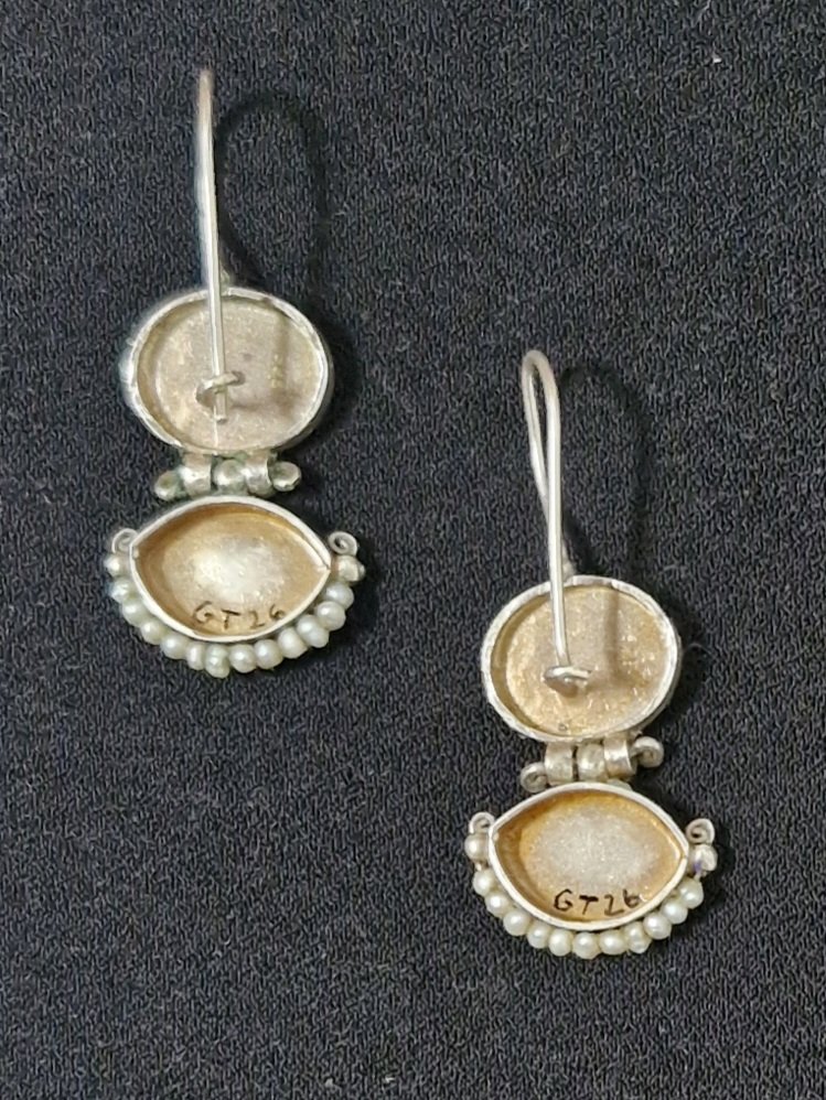 'Strange Moons' earrings (back) : Sterling silver, seed pearls, oil paint, enamel. Currently showing at The Collaboration, New Plymouth, Taranaki NZ