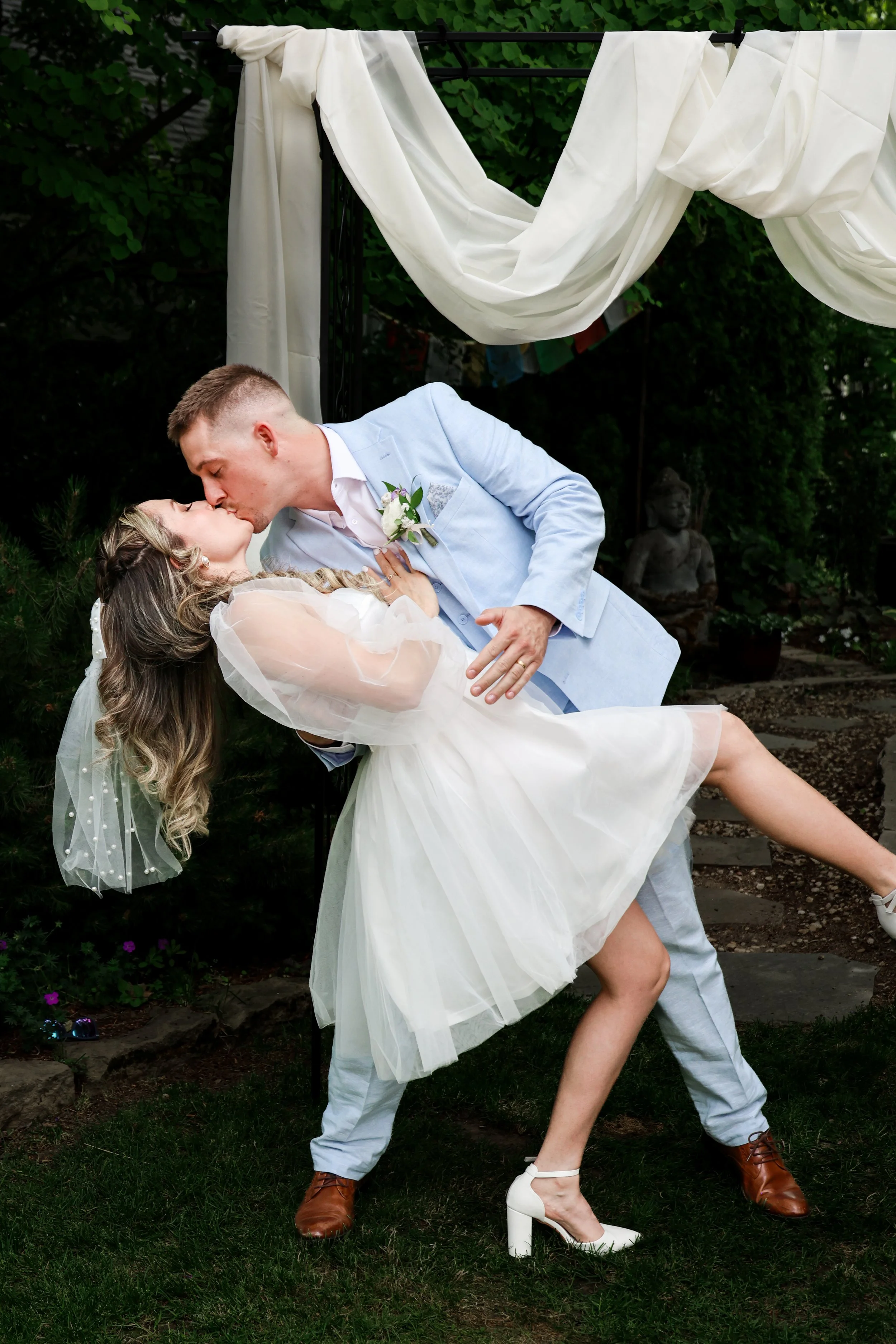 Pacific Northwest outdoor wedding ceremony kiss — NYLEAR documentary wedding photography in Bellingham WA capturing genuine unposed moments