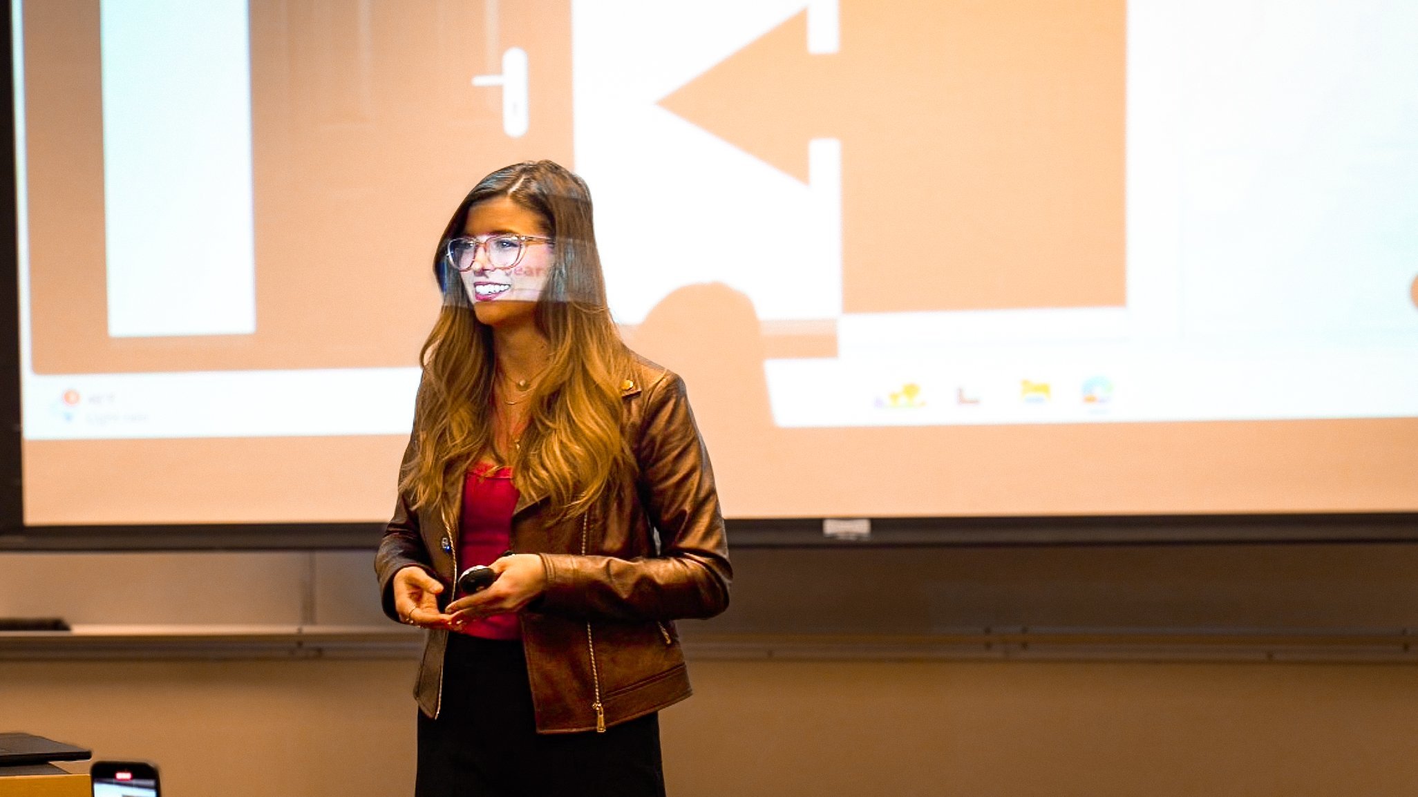 Digital marketing strategy presentation — NYLEAR founder speaking at a Pacific Northwest business or civic event