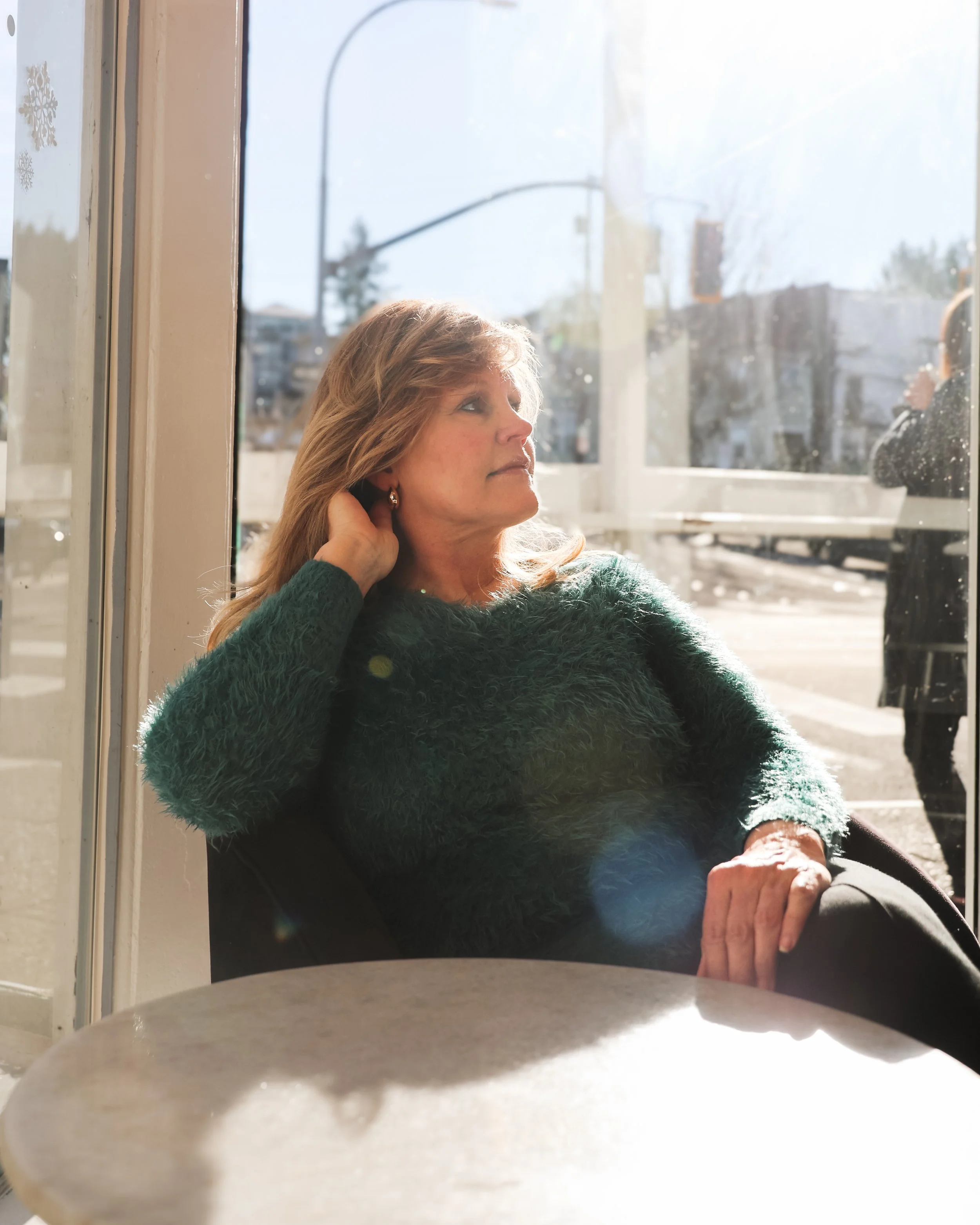 Barbara Jenks of Clearly Communicate thoughtful window portrait — personal branding shoot by NYLEAR Bellingham WA