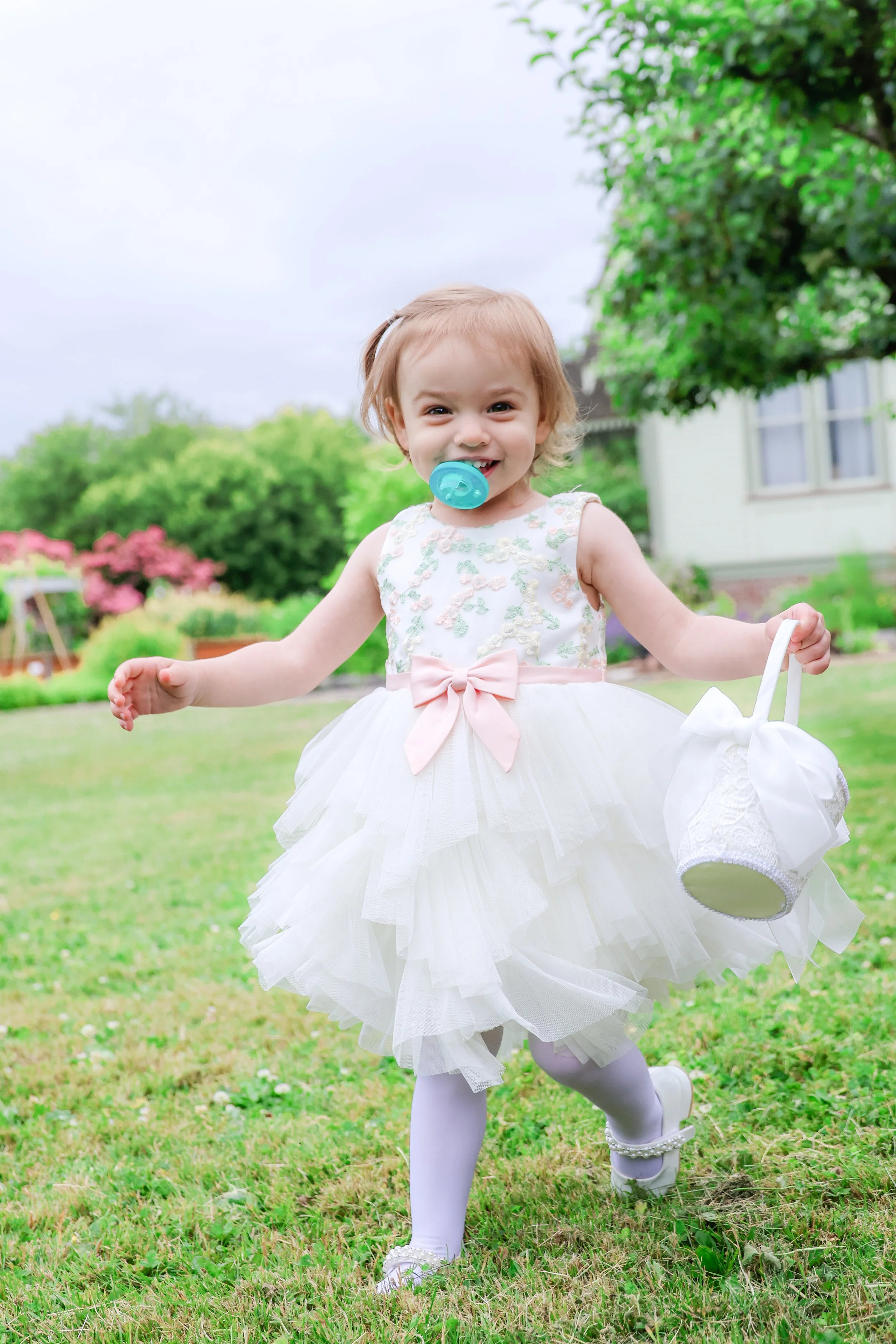 Wedding guest child at Pacific Northwest ceremony — NYLEAR documentary wedding photography Bellingham WA capturing candid natural moments