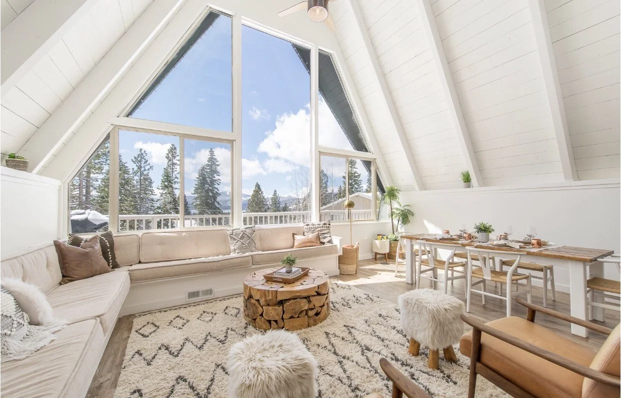 Lake Tahoe A-frame vacation rental interior designed and stocked by Host House. Warm natural materials and layered textures. Lake Tahoe AirBnB.
