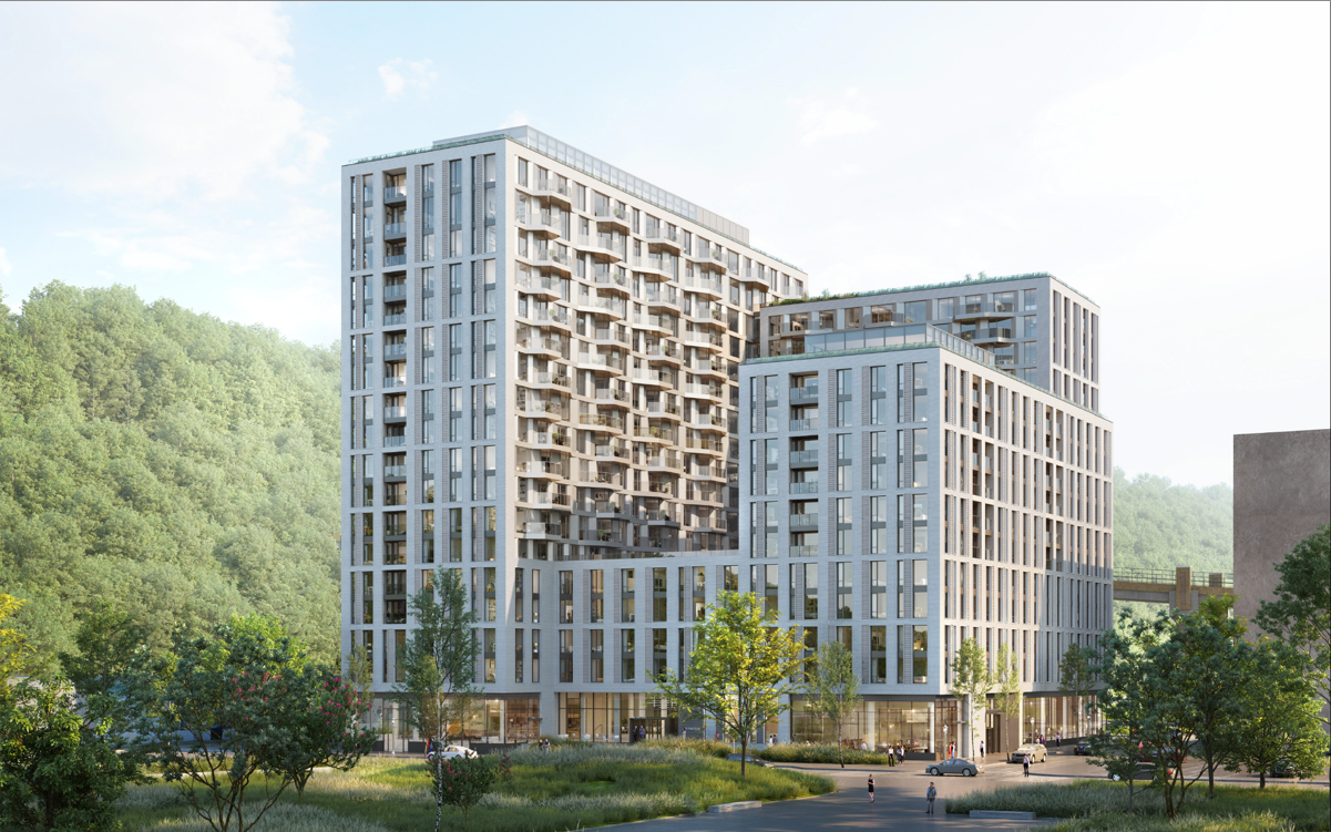 Modern multi-story residential buildings with glass and metal facades, surrounded by greenery and trees, under a partly cloudy sky.