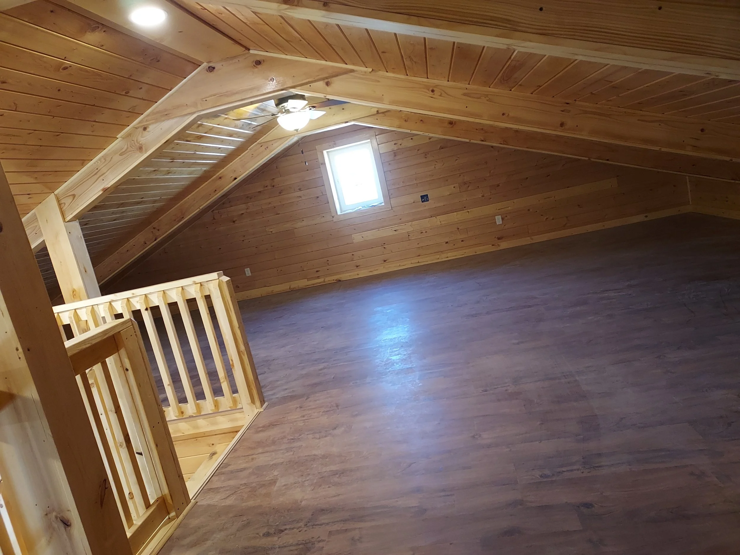 Custom all wood tongue and groove loft and railing. 
