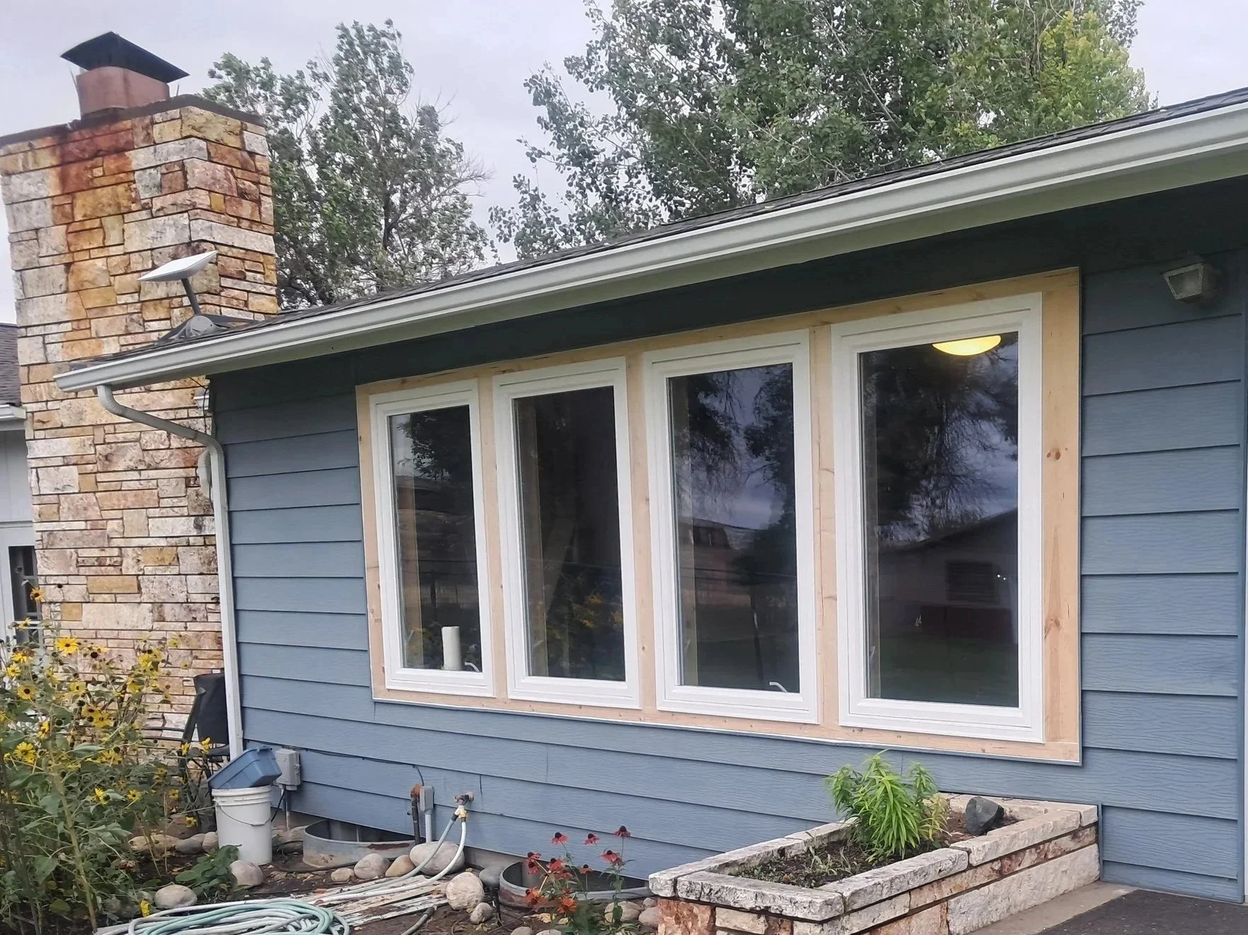 Exterior window replacement and trim work by Zilkoski Construction LLC.