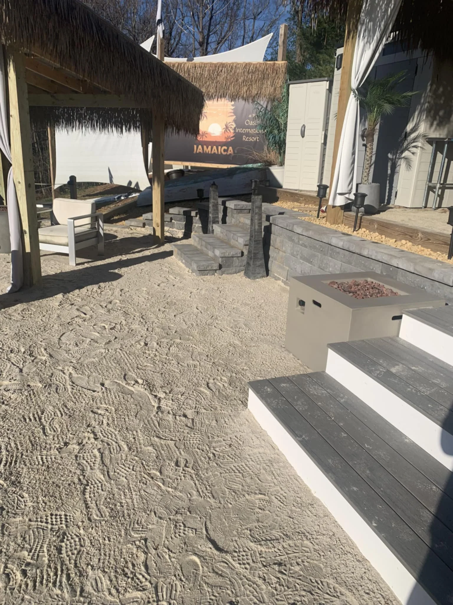 Outdoor Jamaican Beach Themed Area with Custom Stone and Composite Stairs