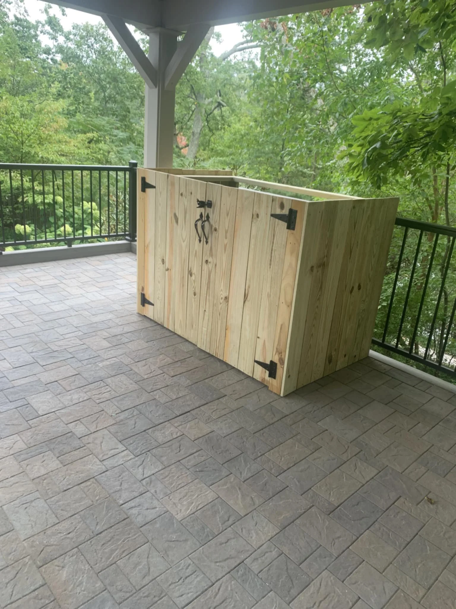 Hardscaped Pavilion Floor with Custom Wood Enclosure and Custom Railing