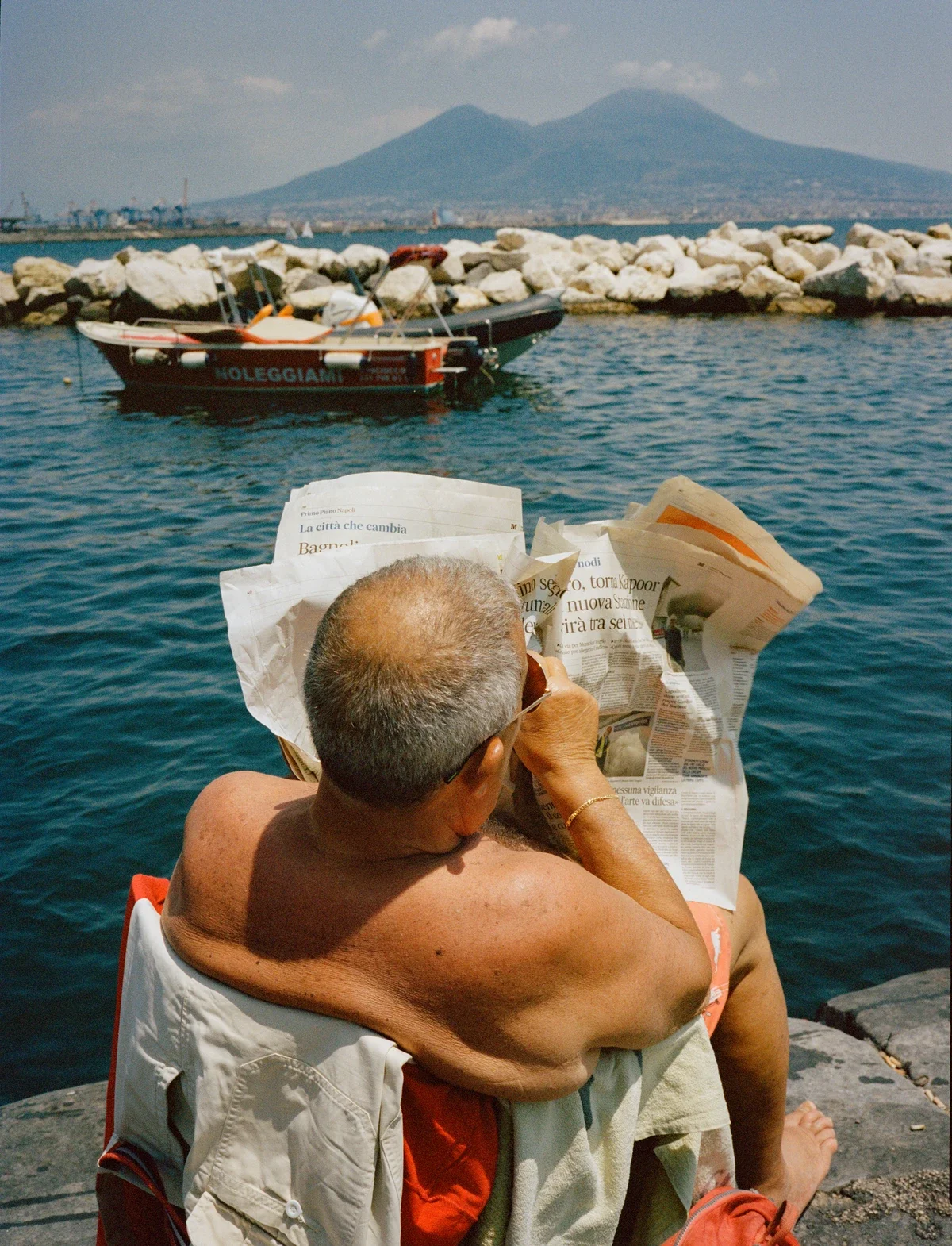 Man Reading Newspaper Sam Youkilis