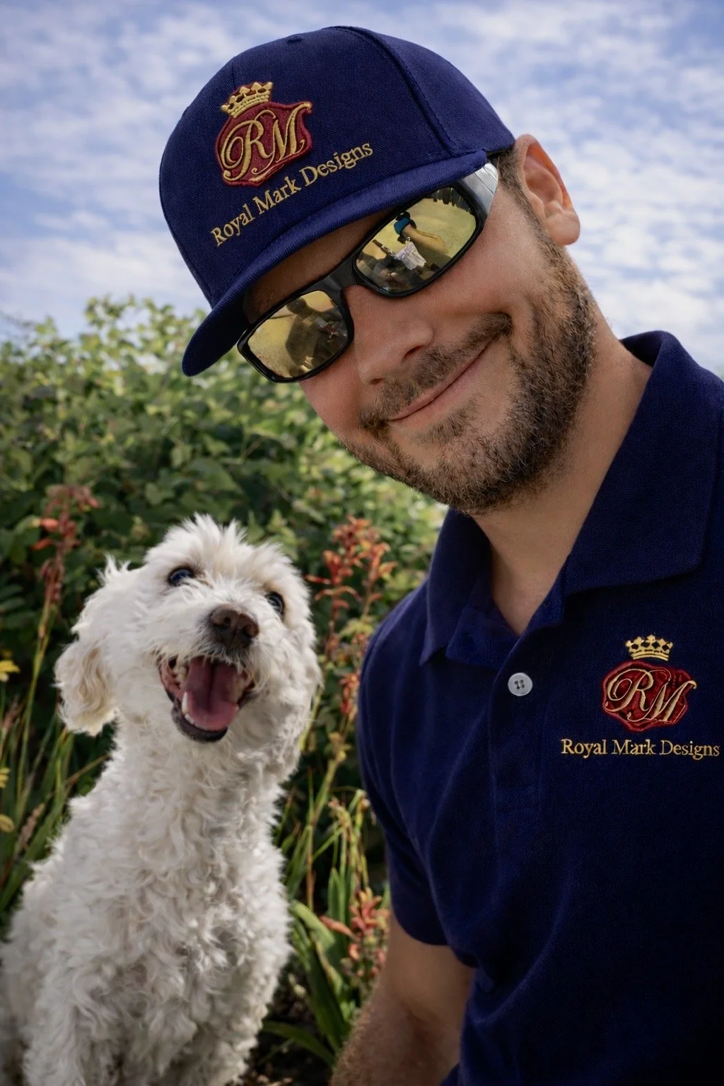 Royal Mark design site visit with white dog